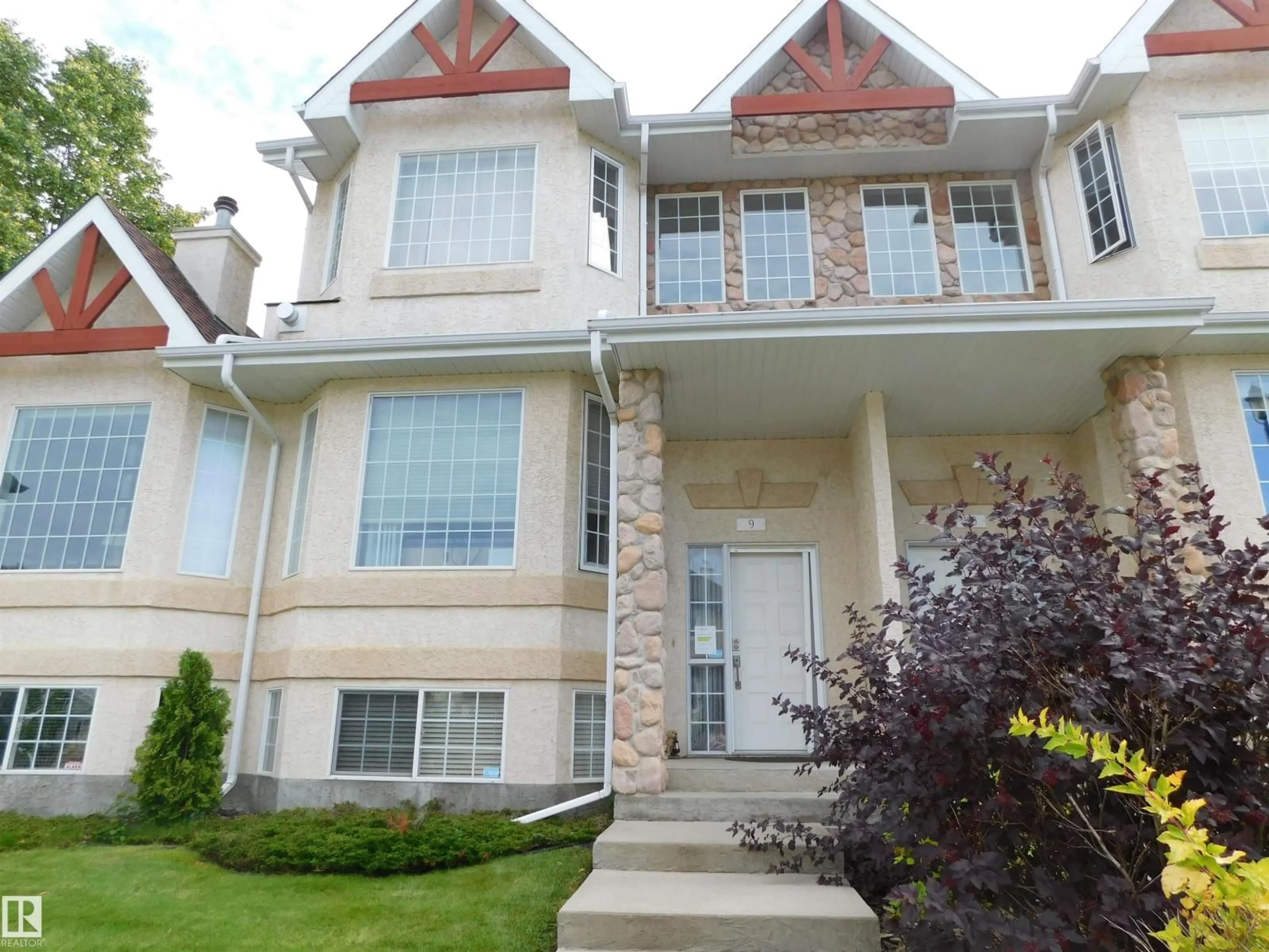 Home with vinyl exterior material, street for #9 - 303 LEGER WY, Edmonton Alberta T6R2X9