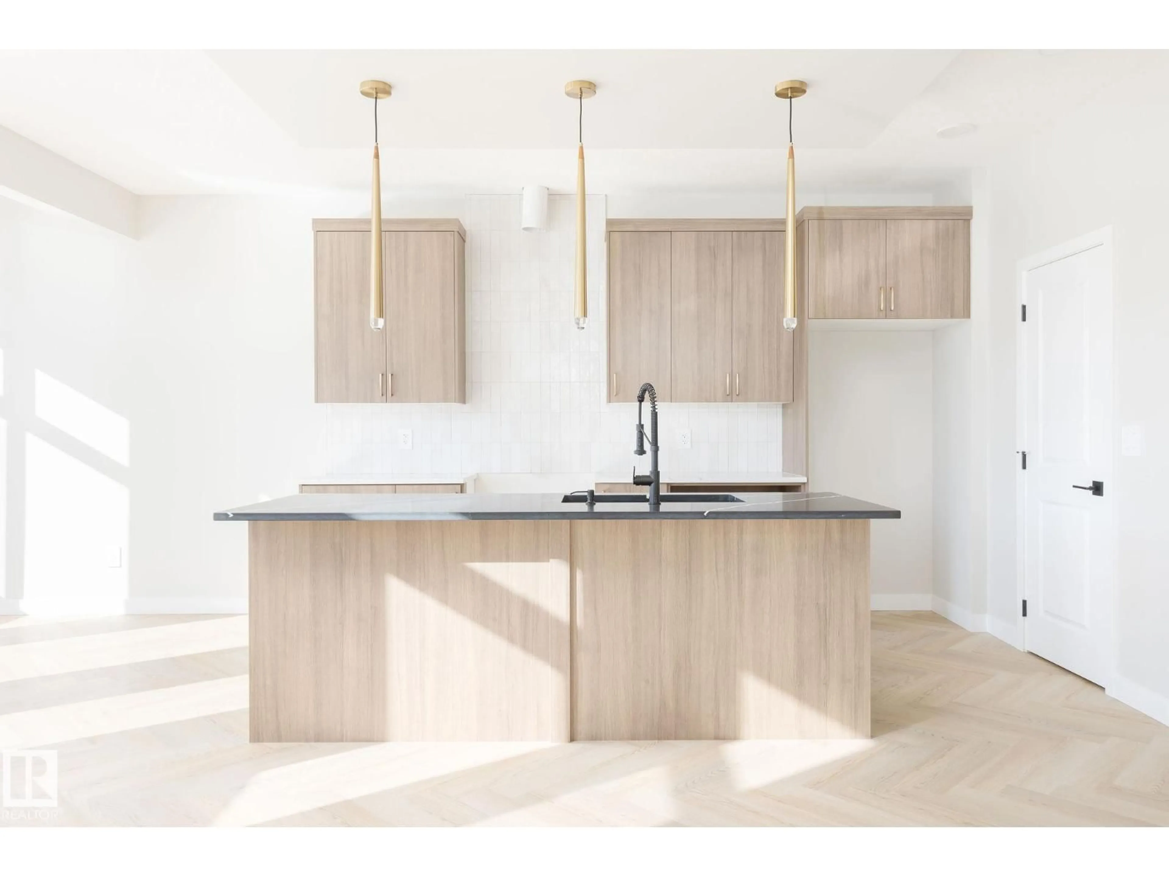 Open concept kitchen, wood/laminate floor for SW - 8287 KIRIAK LO, Edmonton Alberta T6W5S2
