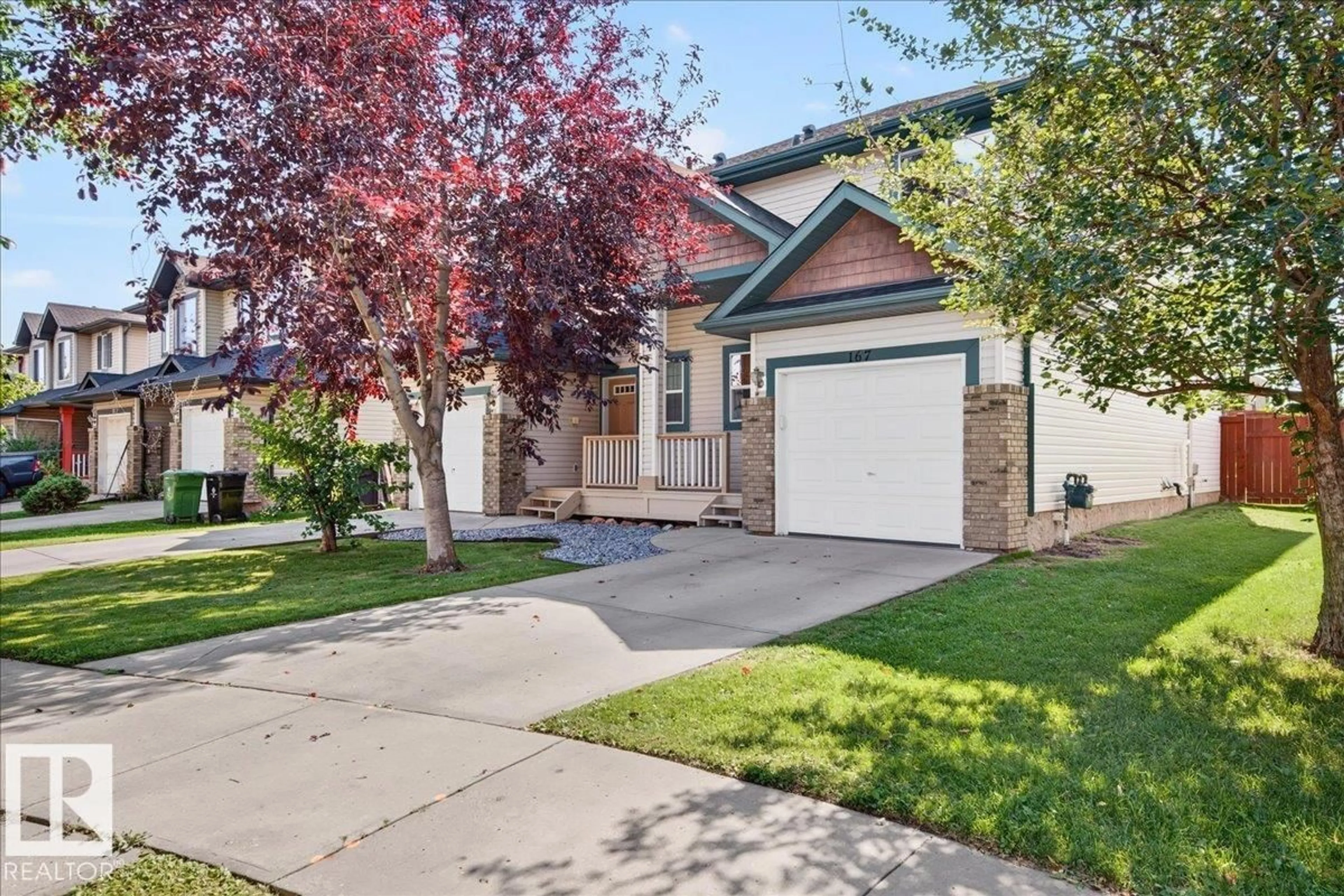 Home with vinyl exterior material, street for 167 GALLOWAY WD, Fort Saskatchewan Alberta T8L0B9