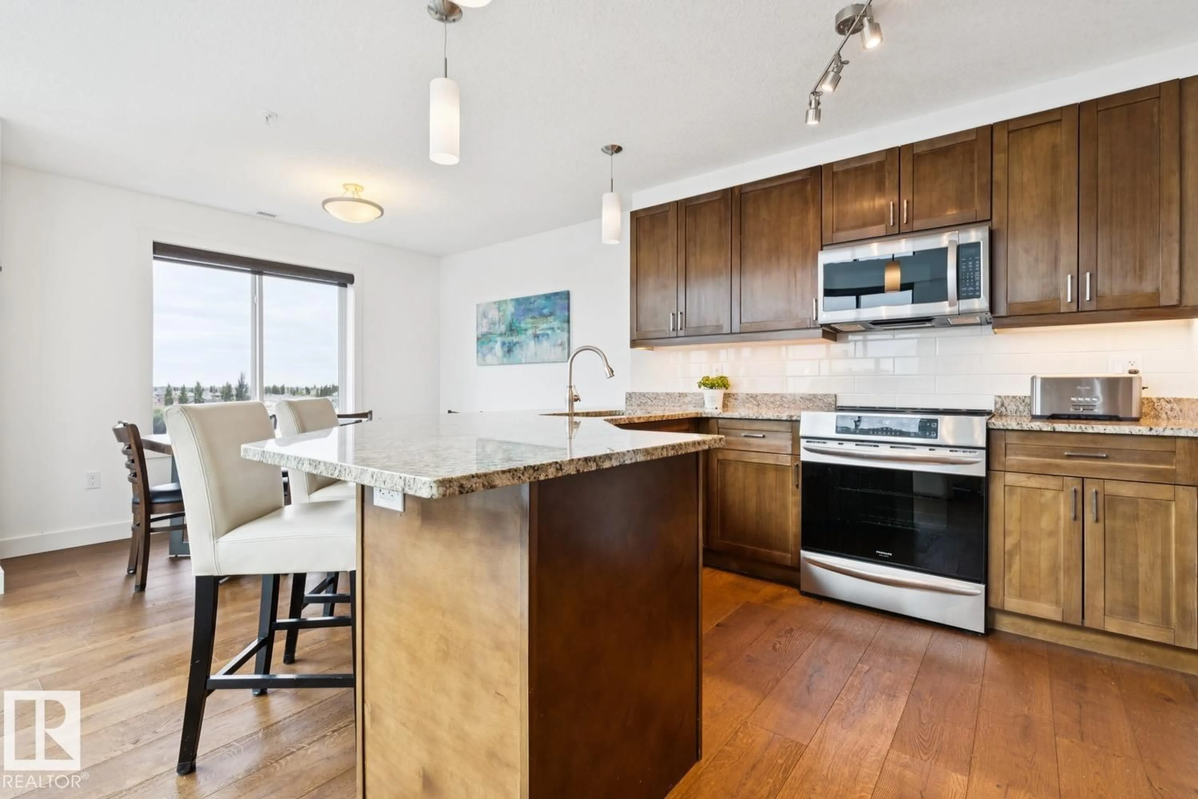 Open concept kitchen, unknown for 506 - 1238 WINDERMERE WY, Edmonton Alberta T6W2J3