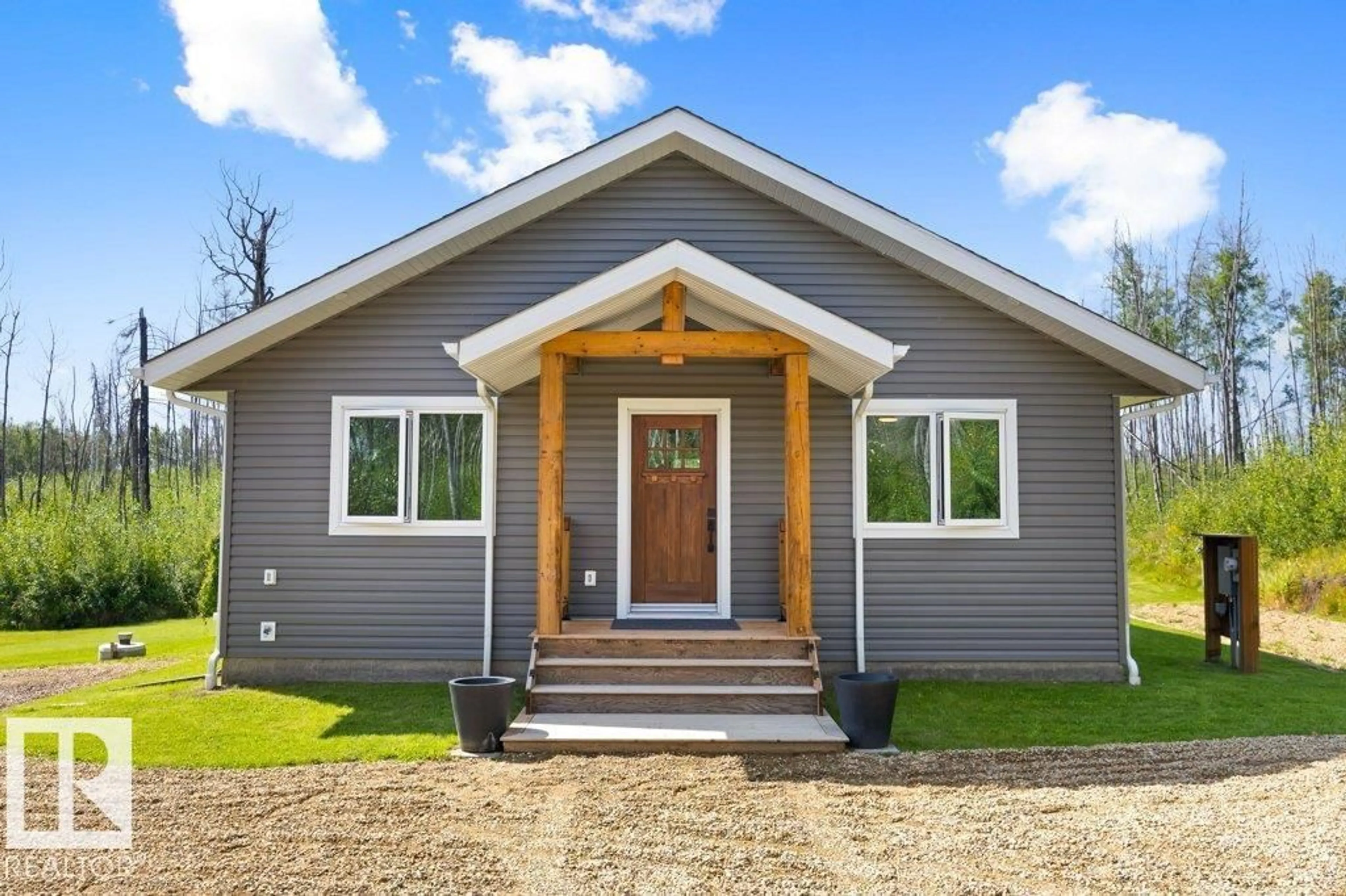 Home with vinyl exterior material, street for #106 - 5124 TWP ROAD 554, Rural Lac Ste. Anne County Alberta T0E0L0
