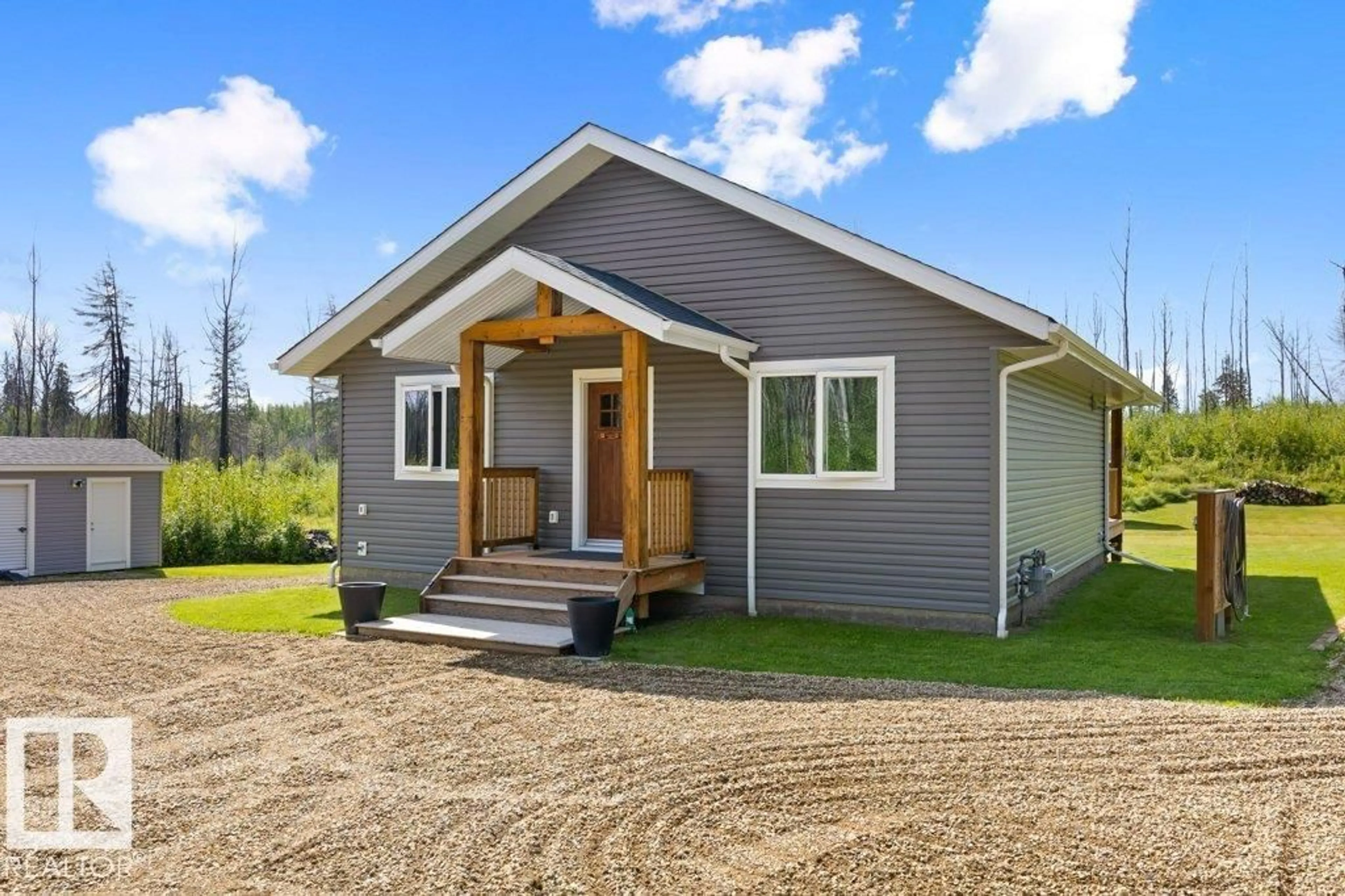Home with vinyl exterior material, building for #106 - 5124 TWP ROAD 554, Rural Lac Ste. Anne County Alberta T0E0L0