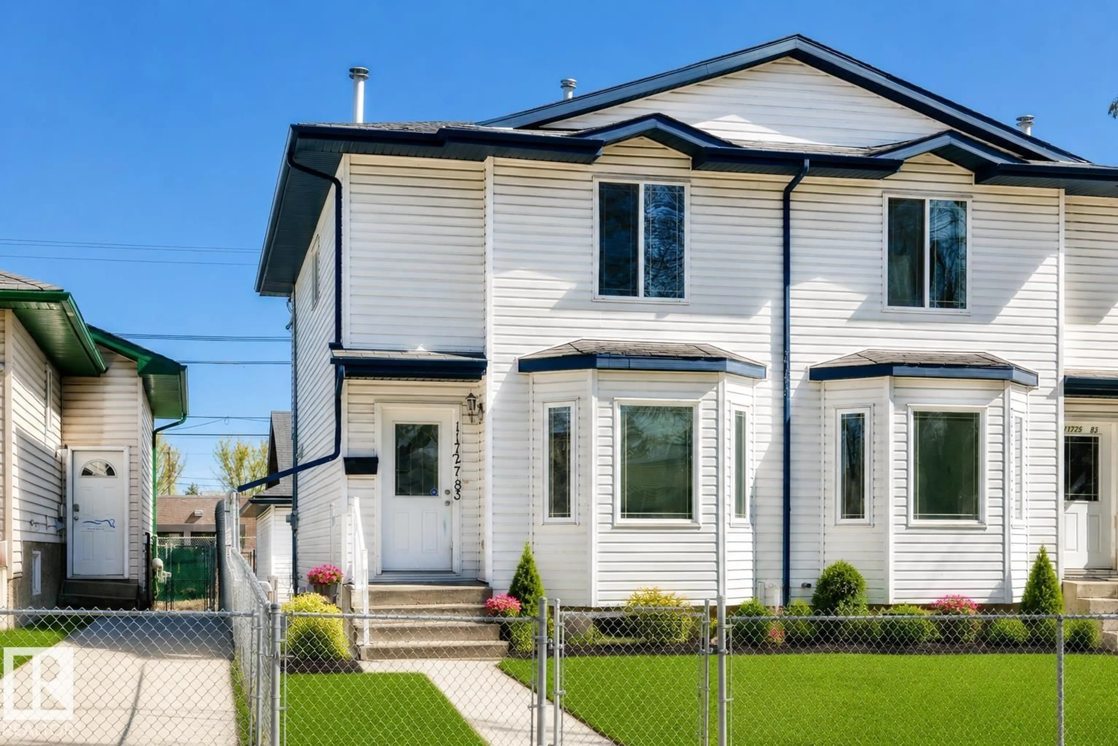 Home with vinyl exterior material, street for NW - 11727 83 ST, Edmonton Alberta T5B2Z1