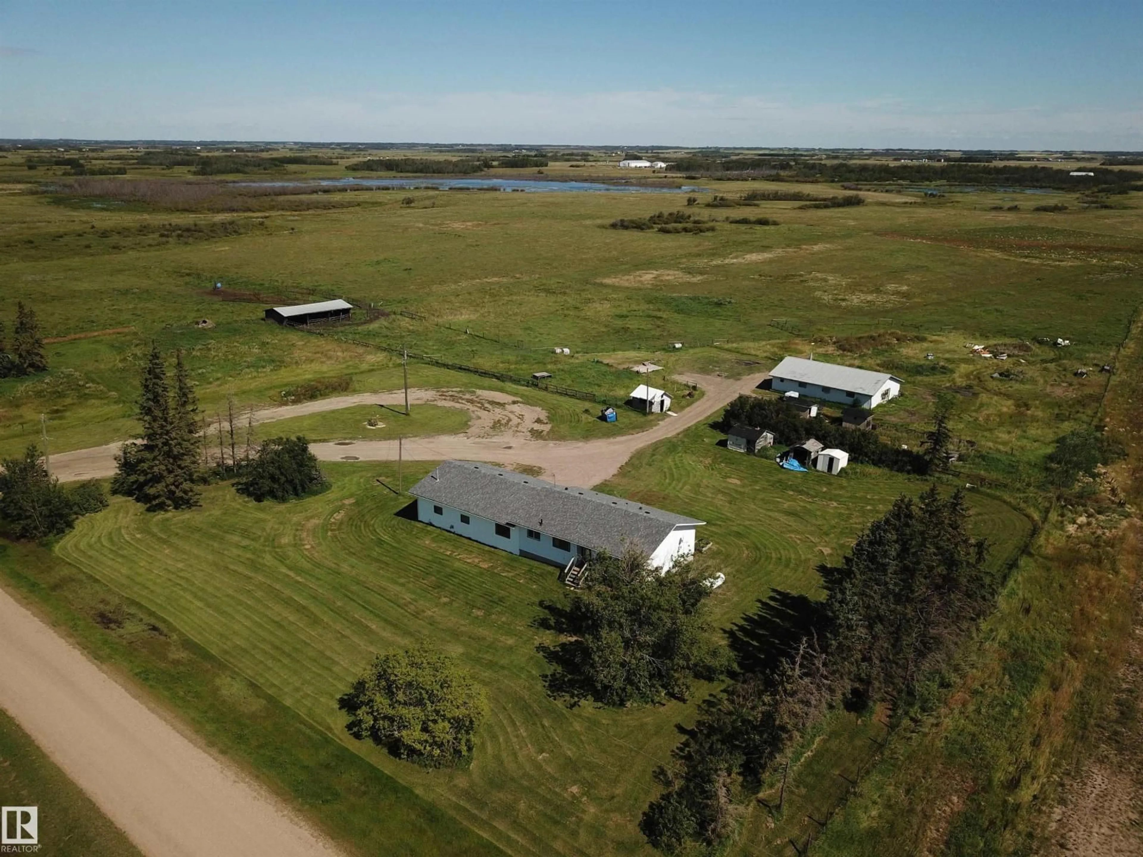 A pic from outside/outdoor area/front of a property/back of a property/a pic from drone, water/lake/river/ocean view for 532037 RG RD 182, Rural Lamont County Alberta T0B4J5