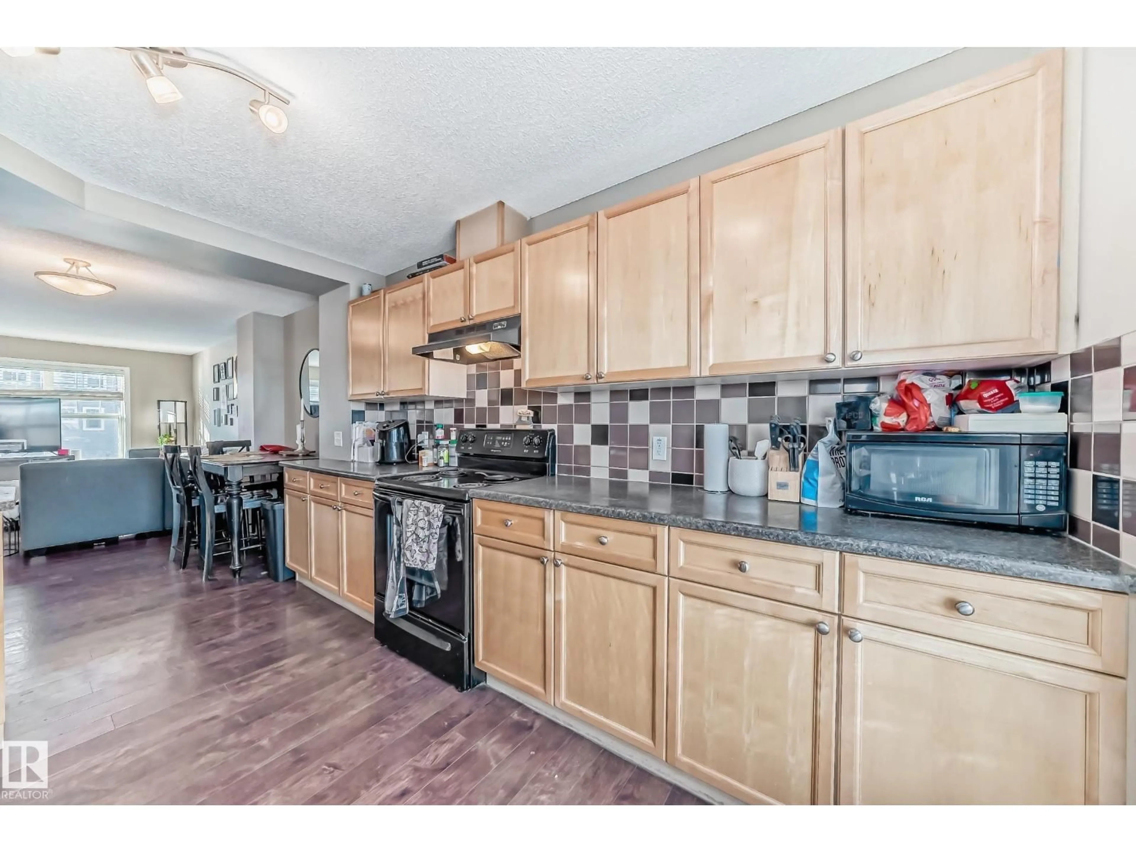 Open concept kitchen, unknown for 119 - 5604 199 ST, Edmonton Alberta T6M2Z9