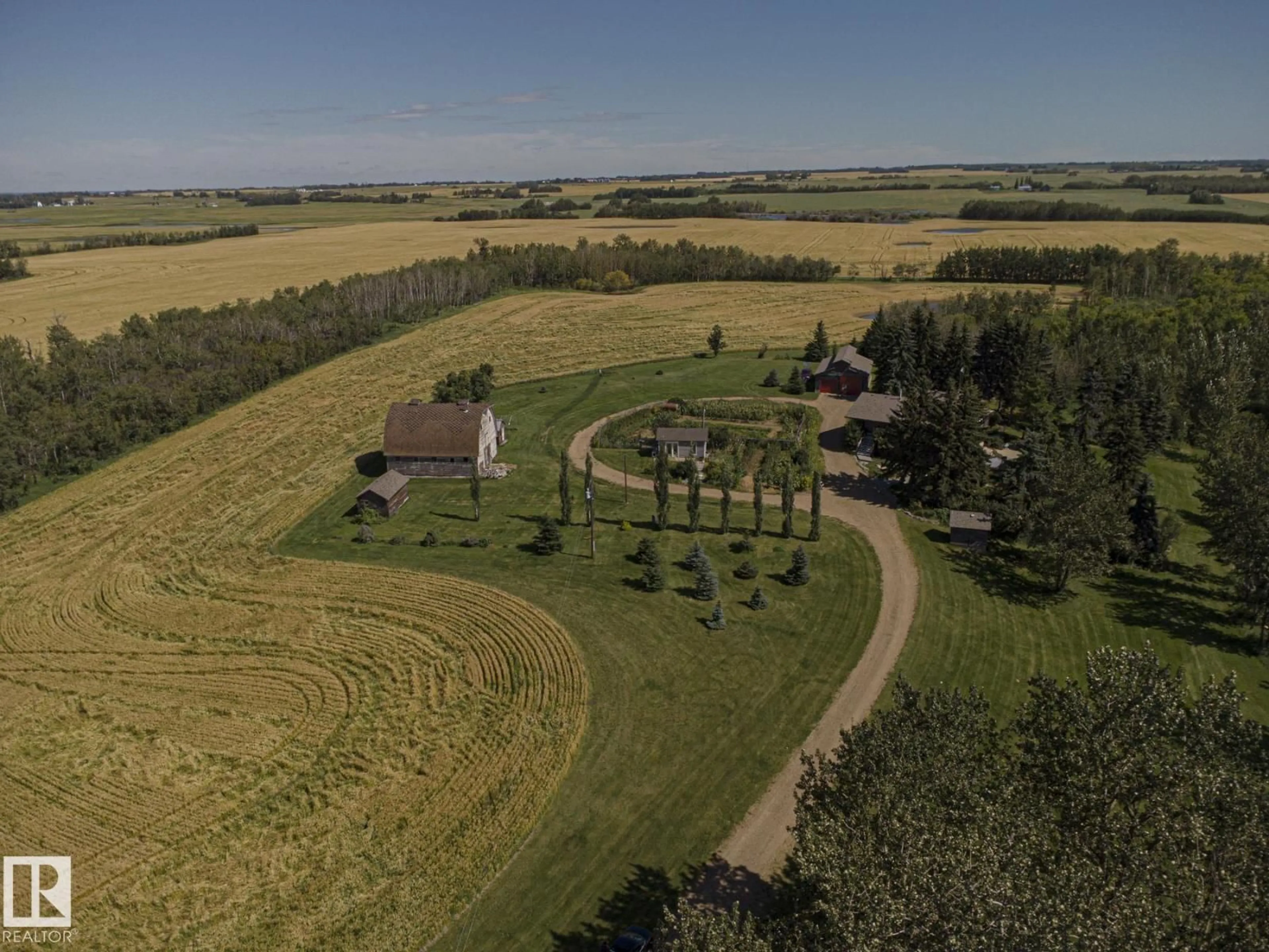 A pic from outside/outdoor area/front of a property/back of a property/a pic from drone, street for 55257 RGE RD 212, Rural Strathcona County Alberta T8L4A9