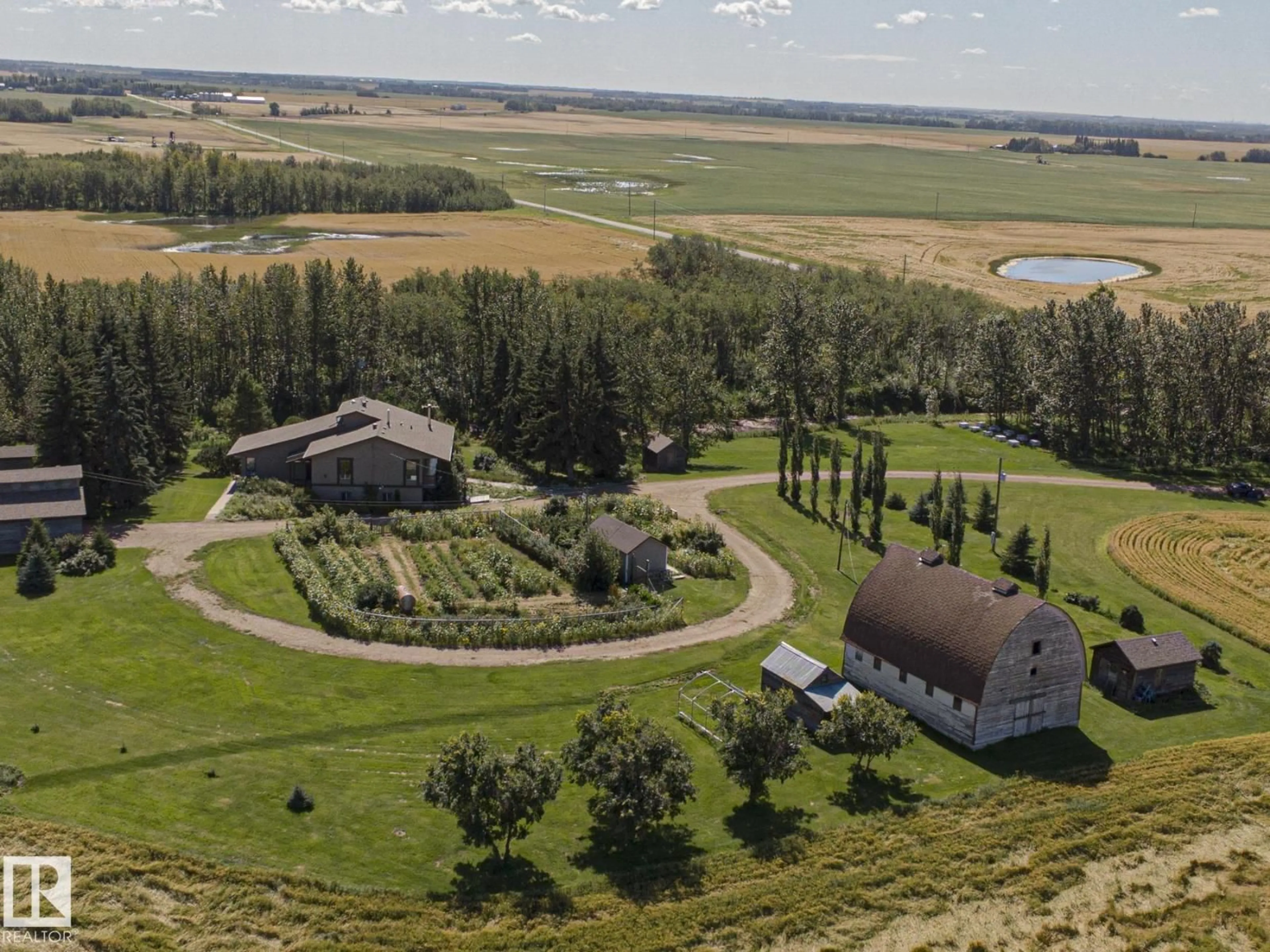 A pic from outside/outdoor area/front of a property/back of a property/a pic from drone, mountain view for 55257 RGE RD 212, Rural Strathcona County Alberta T8L4A9