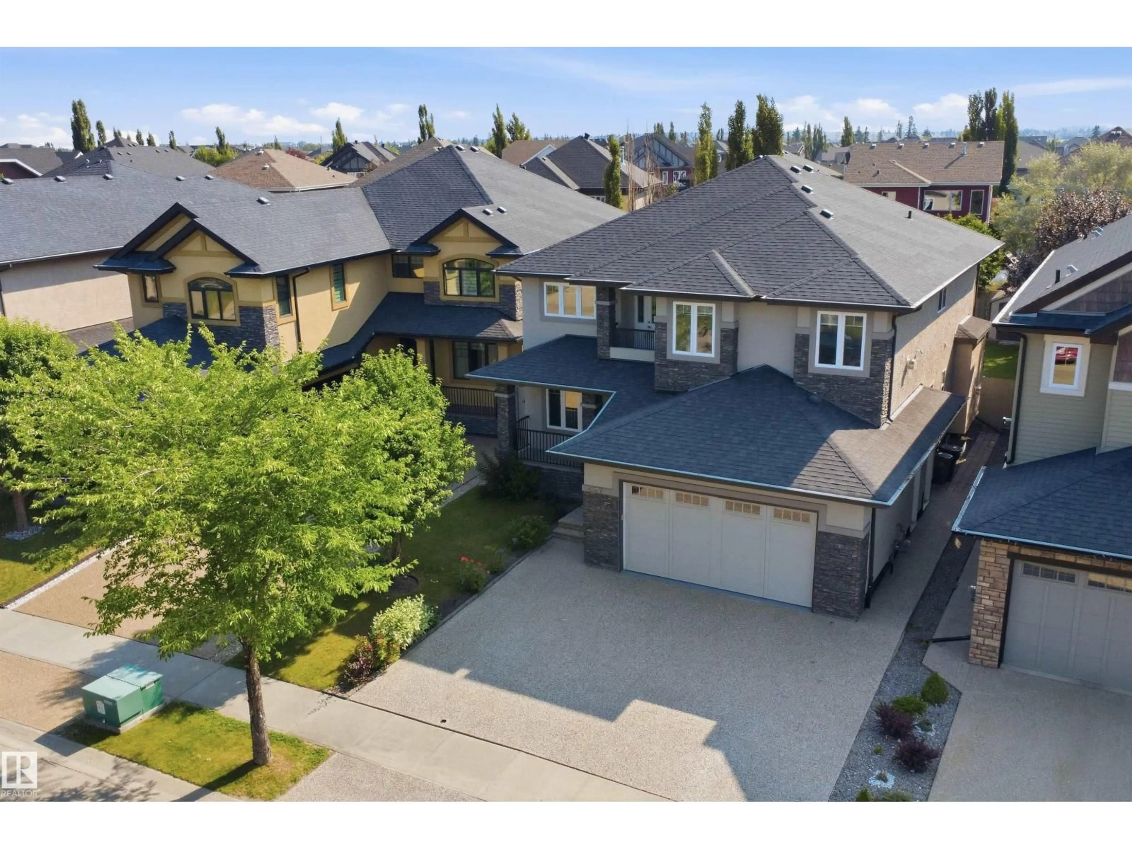 A pic from outside/outdoor area/front of a property/back of a property/a pic from drone, street for 427 WINDERMERE RD, Edmonton Alberta T6W0T3