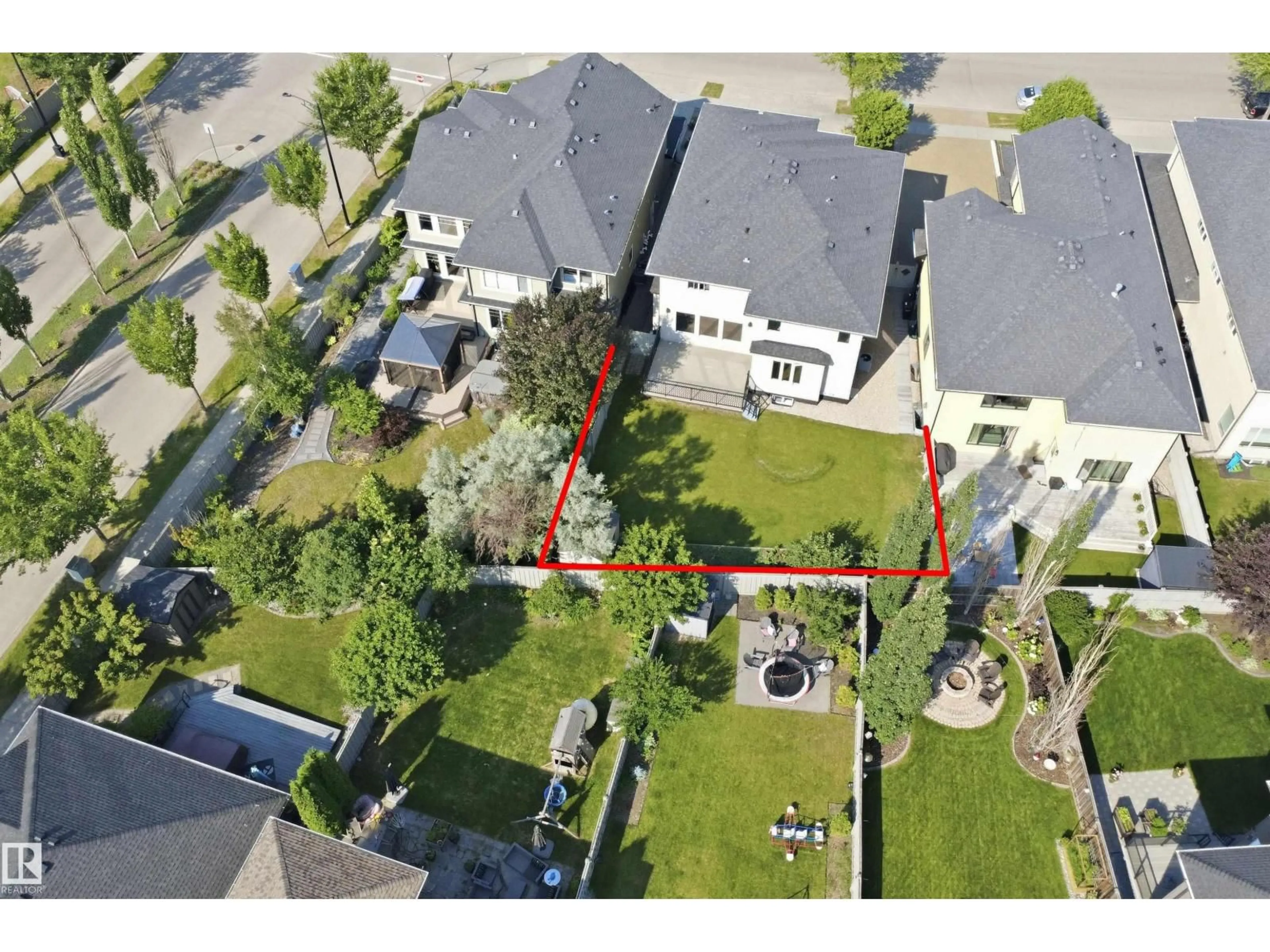 A pic from outside/outdoor area/front of a property/back of a property/a pic from drone, street for 427 WINDERMERE RD, Edmonton Alberta T6W0T3