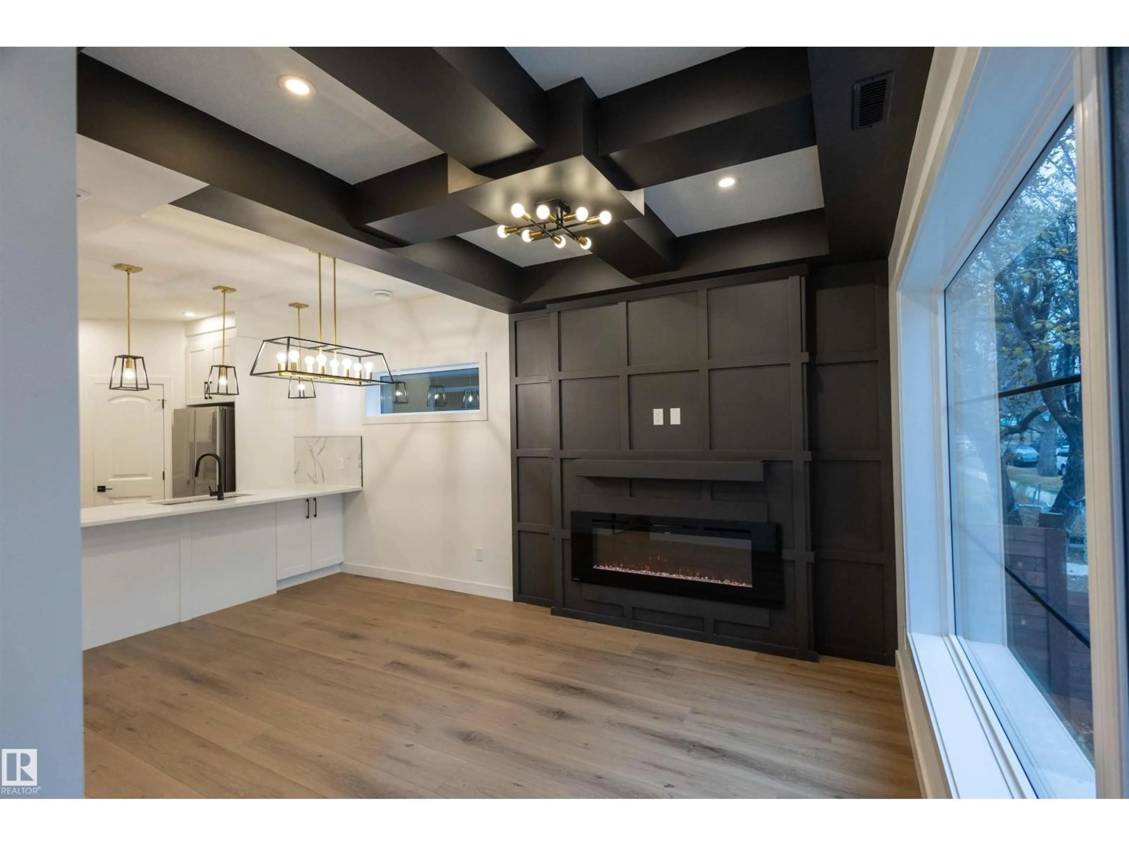 Open concept kitchen, wood/laminate floor for #1 and #2 - 9632 110 AVE NW, Edmonton Alberta T5H1H5
