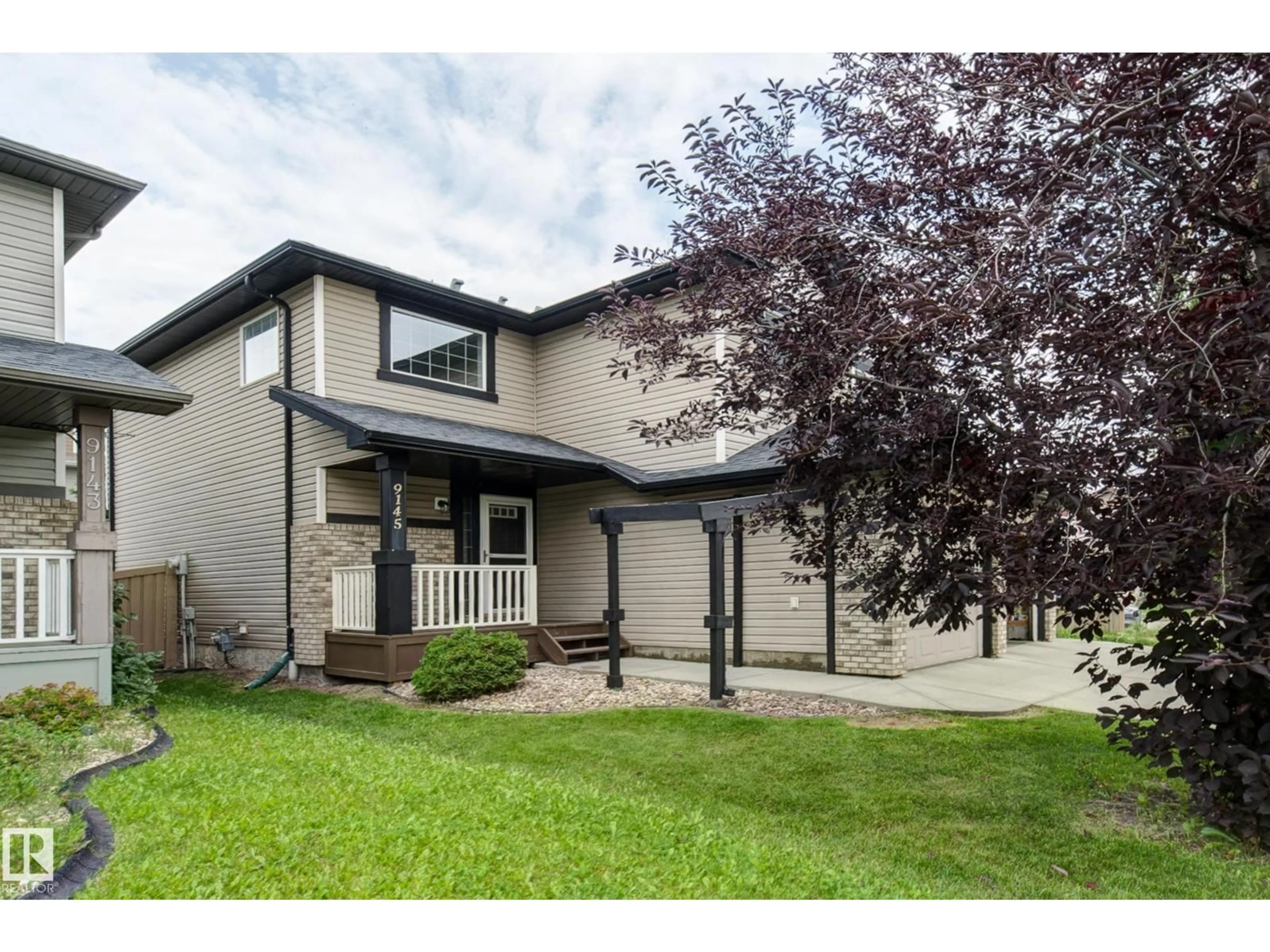 Home with vinyl exterior material, street for 9145 SCOTT CR, Edmonton Alberta T6R0E5