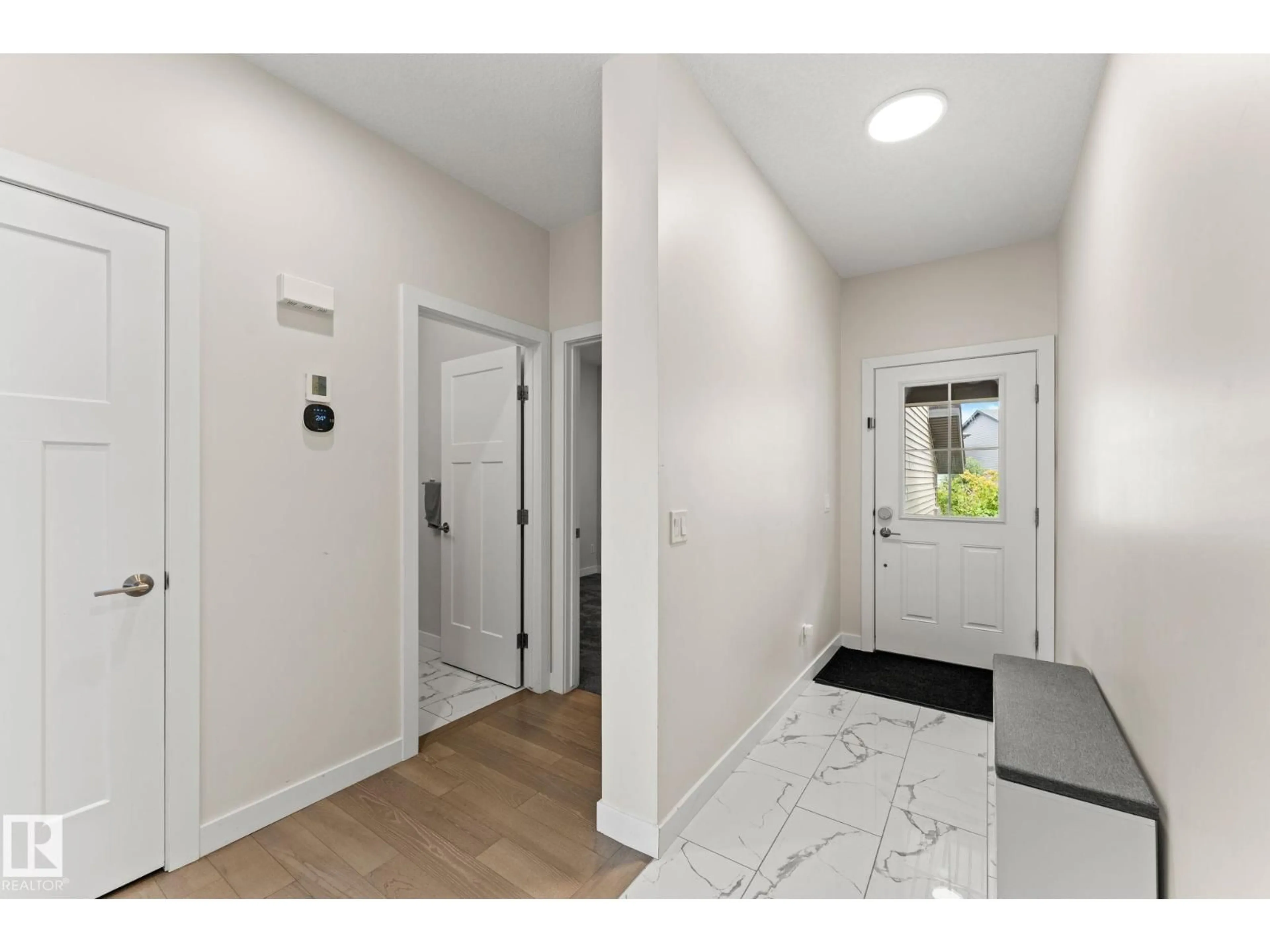 Indoor entryway for NW - 22373 92A AV, Edmonton Alberta T5T7P3