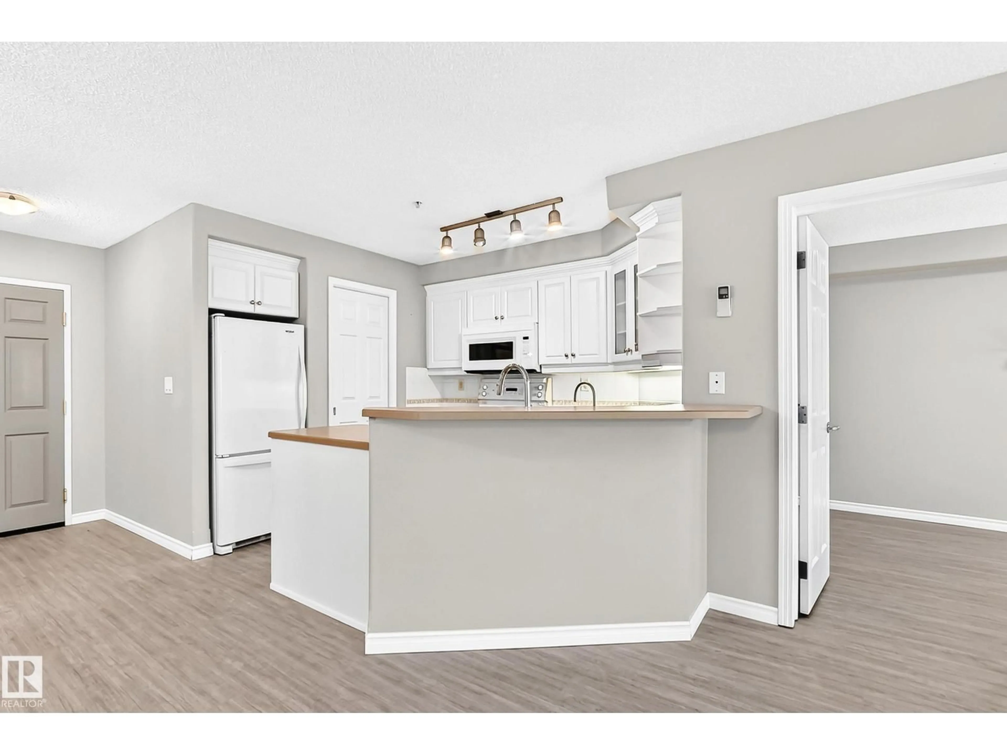 Open concept kitchen, unknown for #137 - 9704 174 ST NW, Edmonton Alberta T5T6J4