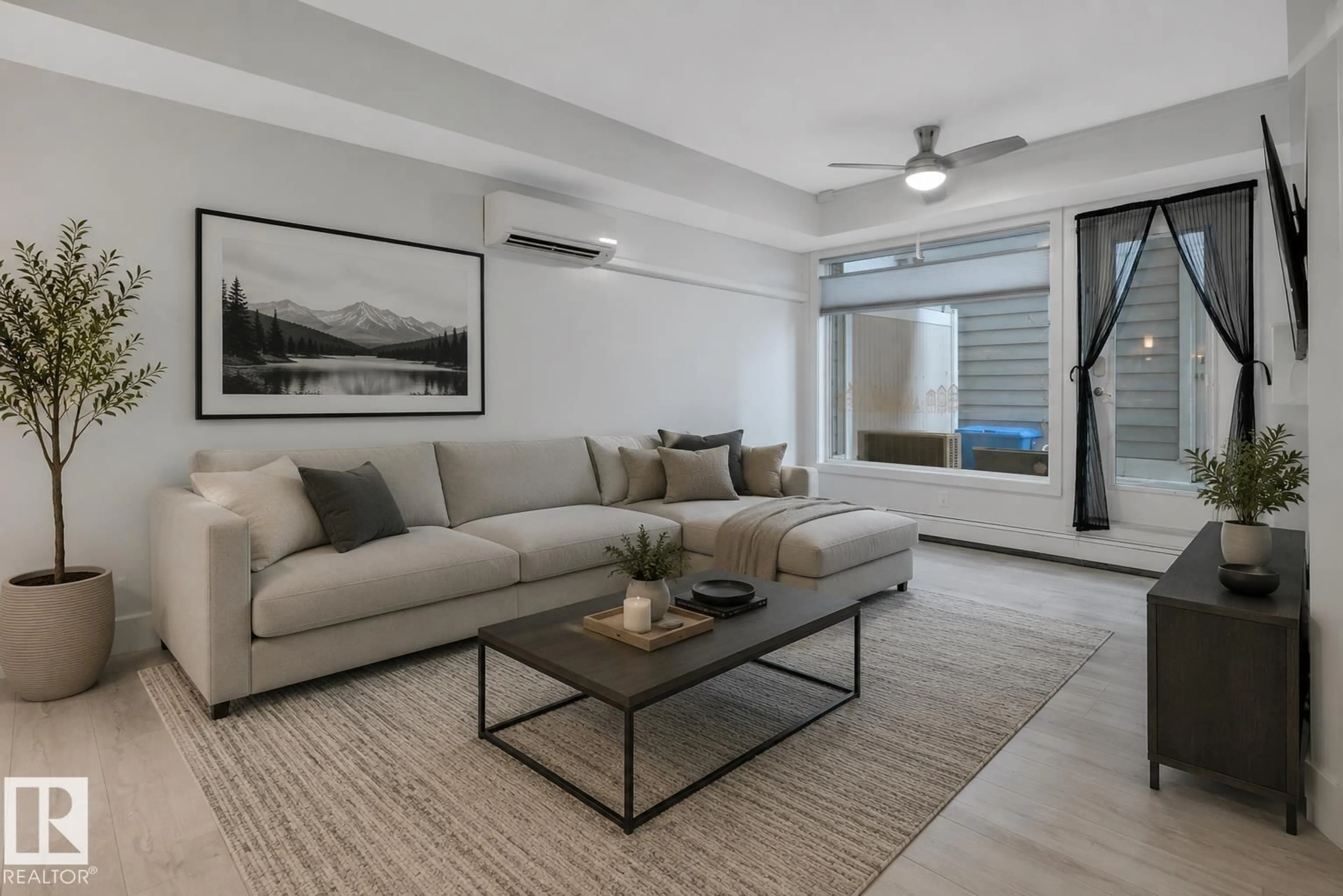 Living room with furniture, unknown for 105 - 10030 83 AV, Edmonton Alberta T6E2C2