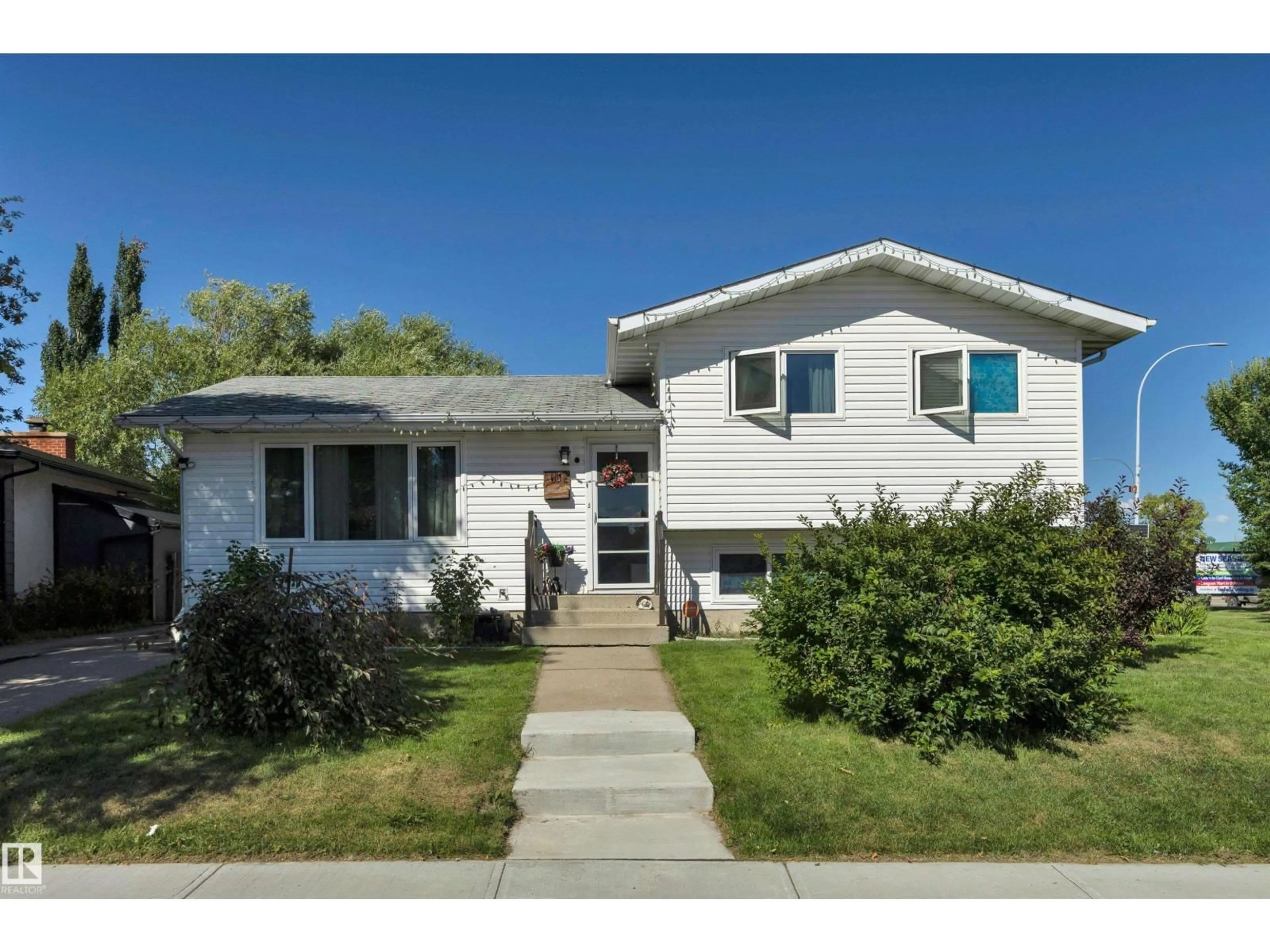 Home with vinyl exterior material, street for 5002 57 AV, Leduc Alberta T9E5S3