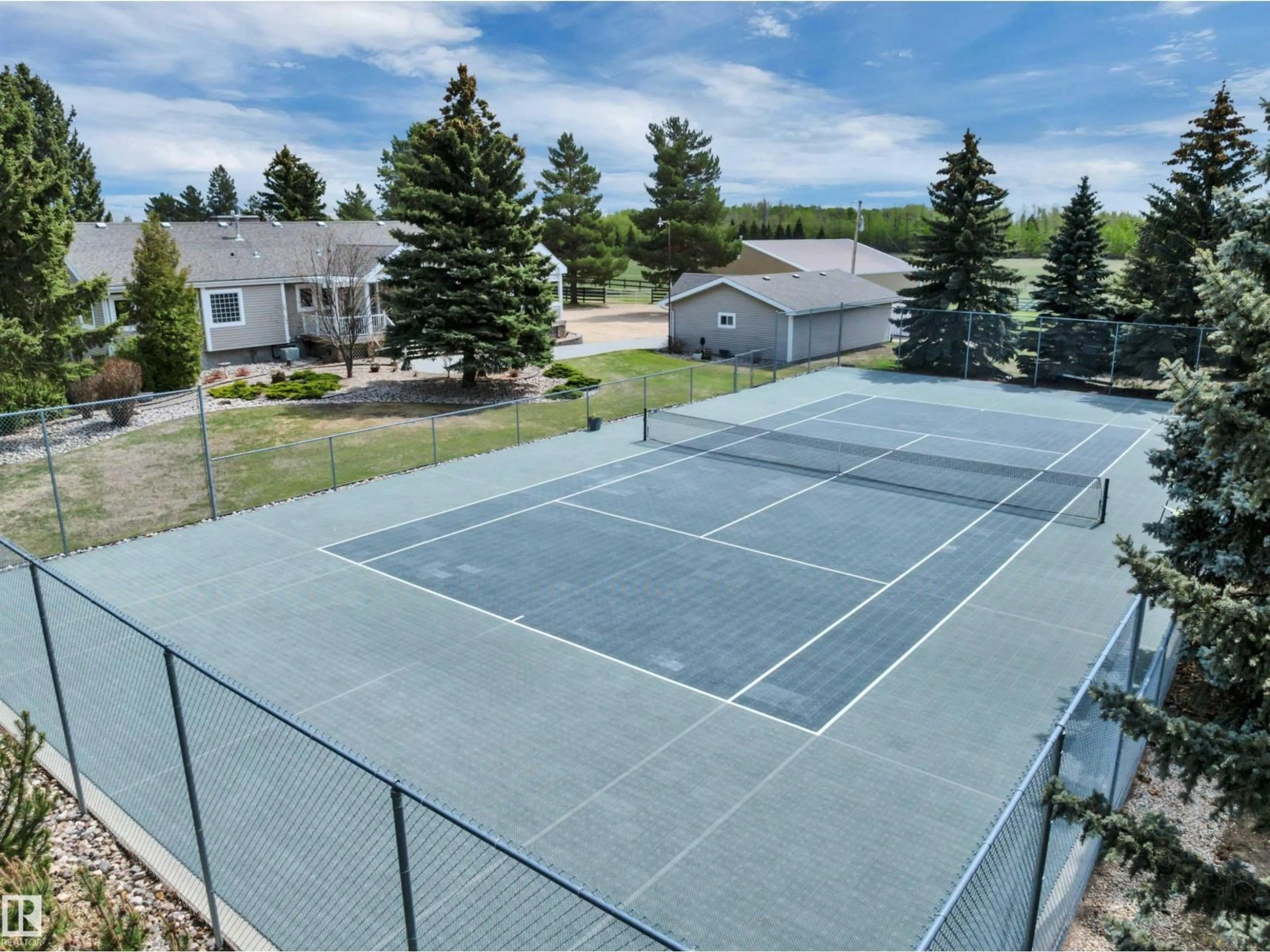 A pic from outside/outdoor area/front of a property/back of a property/a pic from drone, water/lake/river/ocean view for 233 - 464012 A RGE ROAD ROAD, Rural Wetaskiwin County Alberta T9A1X1