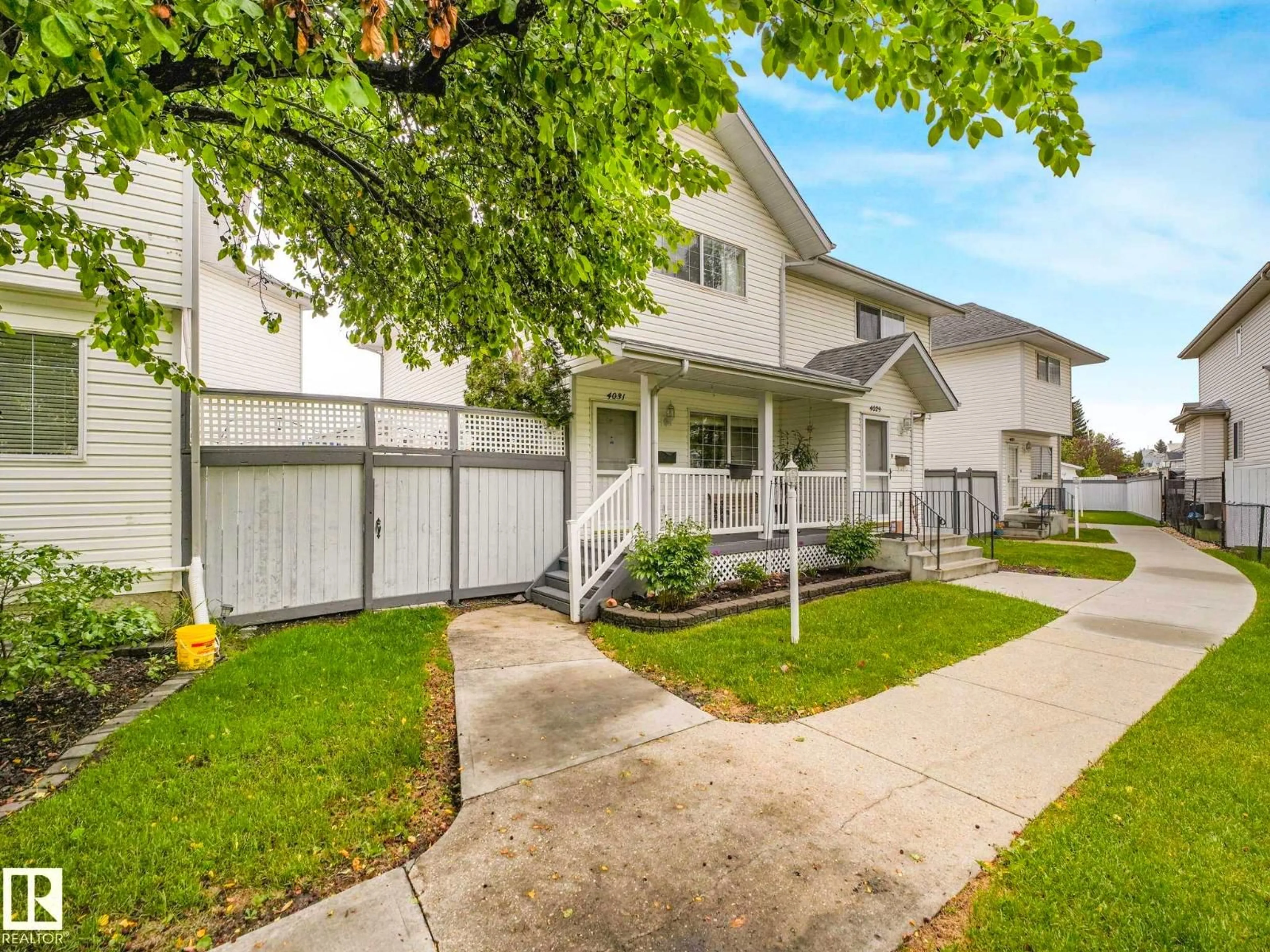 Home with vinyl exterior material, street for 4031 38 STREET NW, Edmonton Alberta T6L6W8