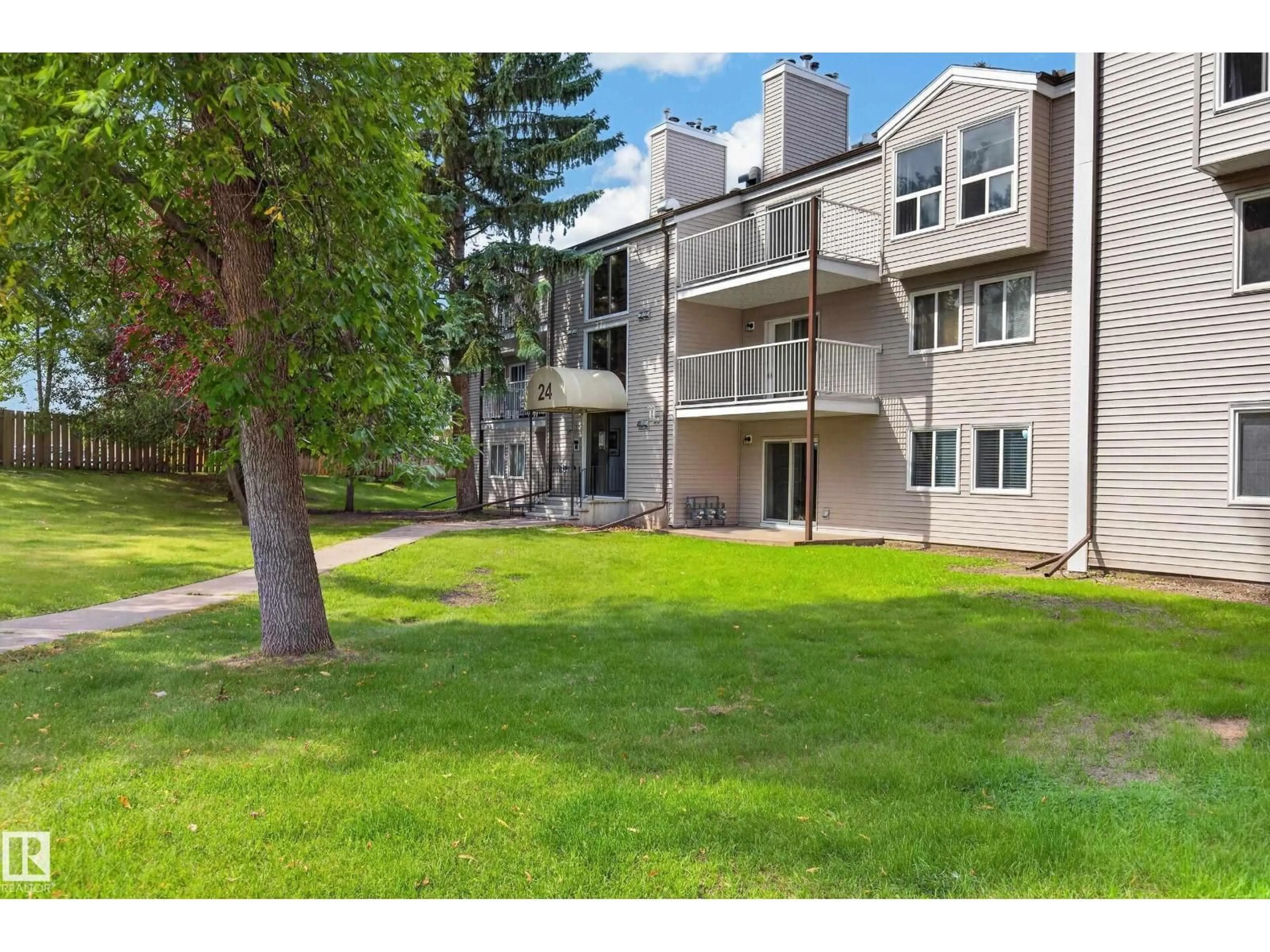 A pic from outside/outdoor area/front of a property/back of a property/a pic from drone, mountain view for #304 - 24 ALPINE PL, St. Albert Alberta T8N2T8