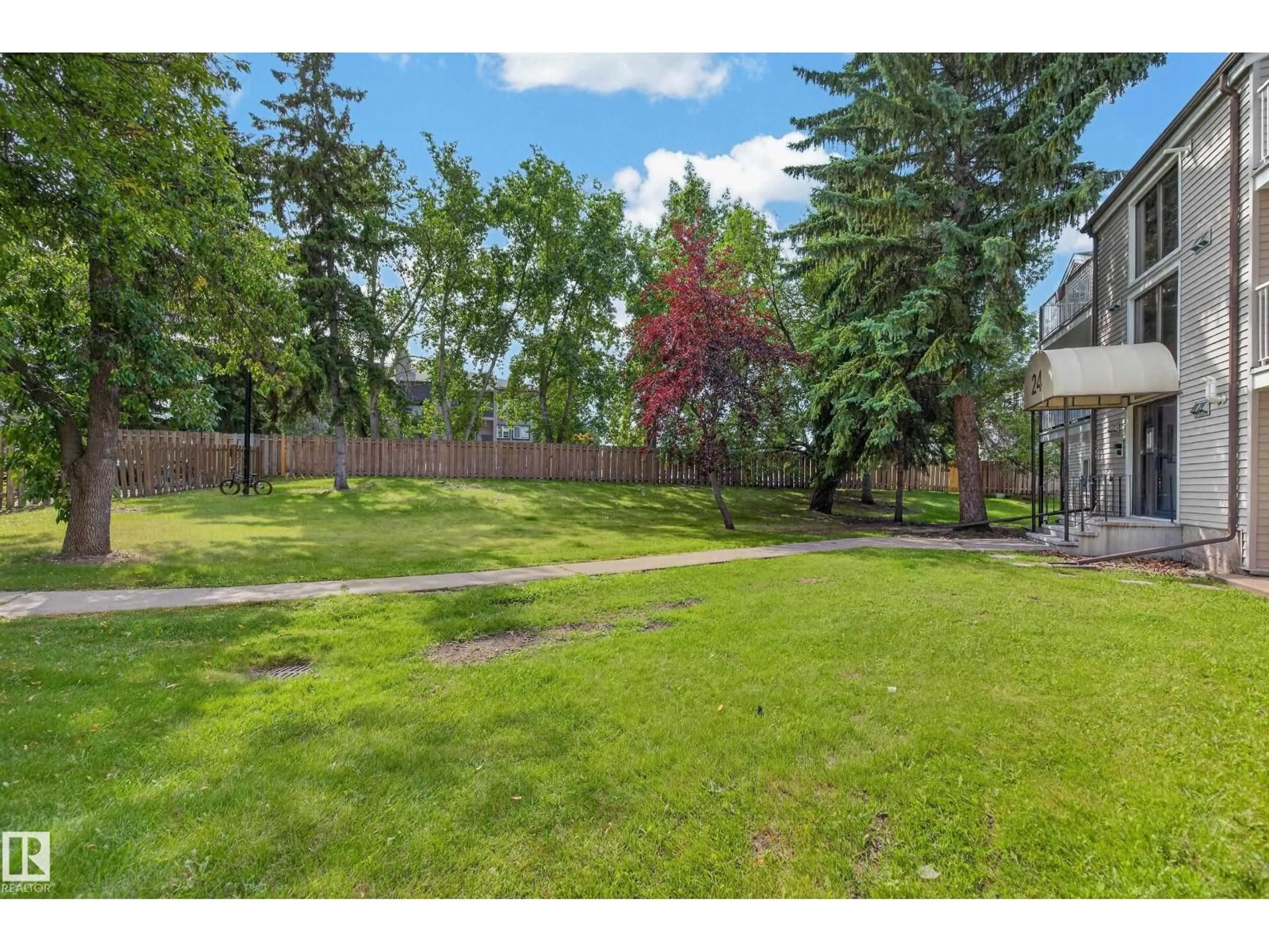 A pic from outside/outdoor area/front of a property/back of a property/a pic from drone, forest/trees view for #304 - 24 ALPINE PL, St. Albert Alberta T8N2T8