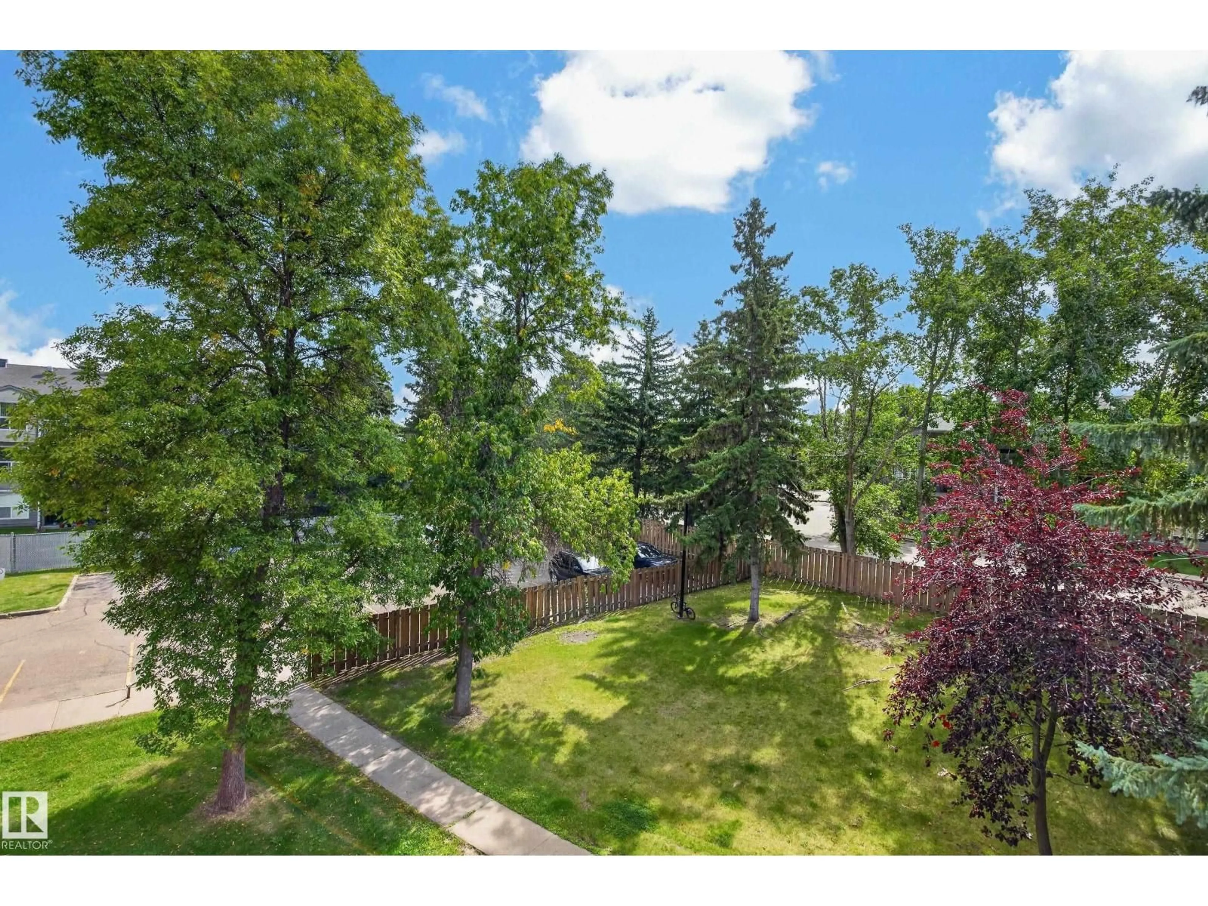 A pic from outside/outdoor area/front of a property/back of a property/a pic from drone, forest/trees view for #304 - 24 ALPINE PL, St. Albert Alberta T8N2T8