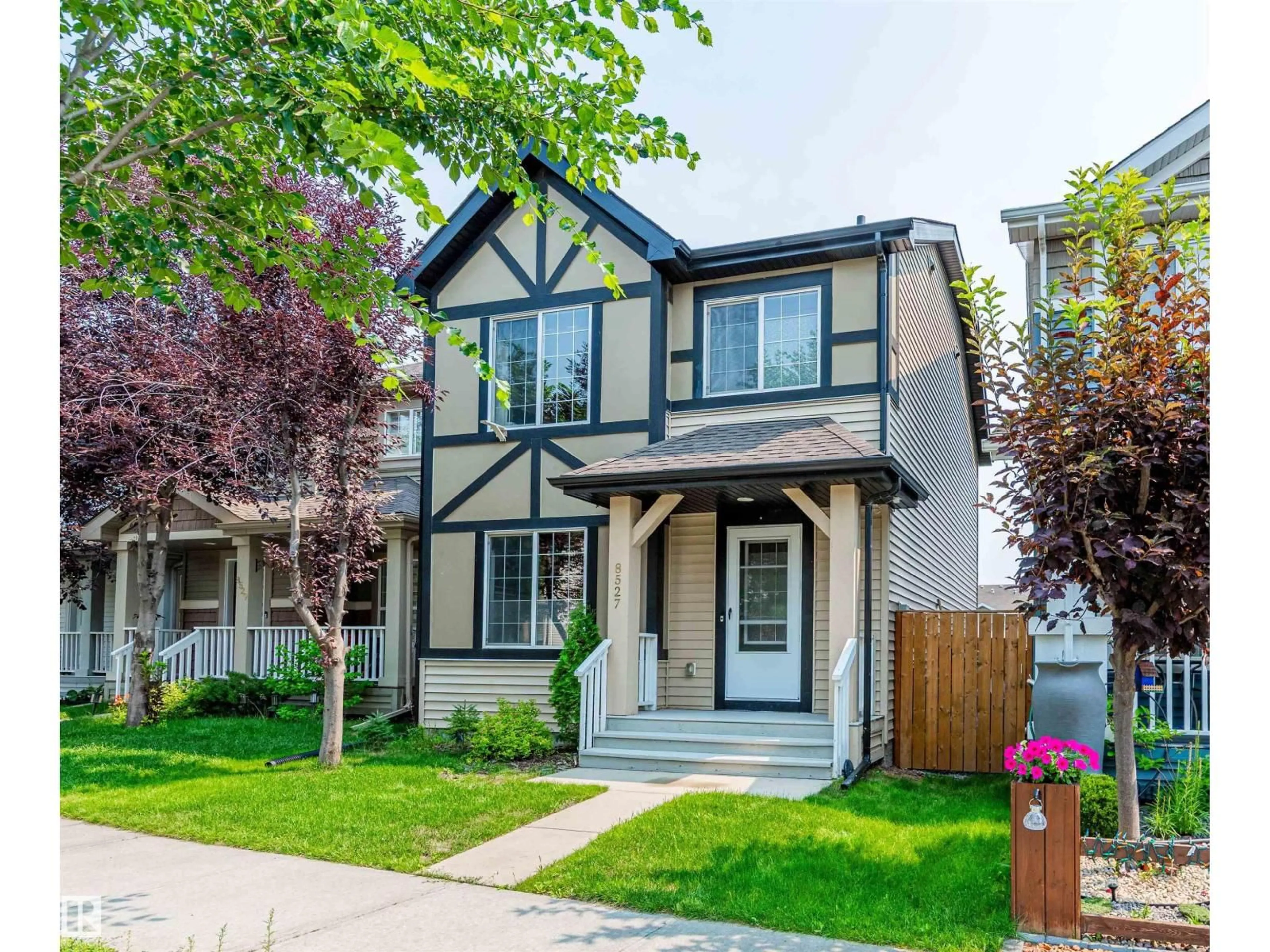 Home with vinyl exterior material, street for 8527 ELLIS LINK NW, Edmonton Alberta T6M0P5