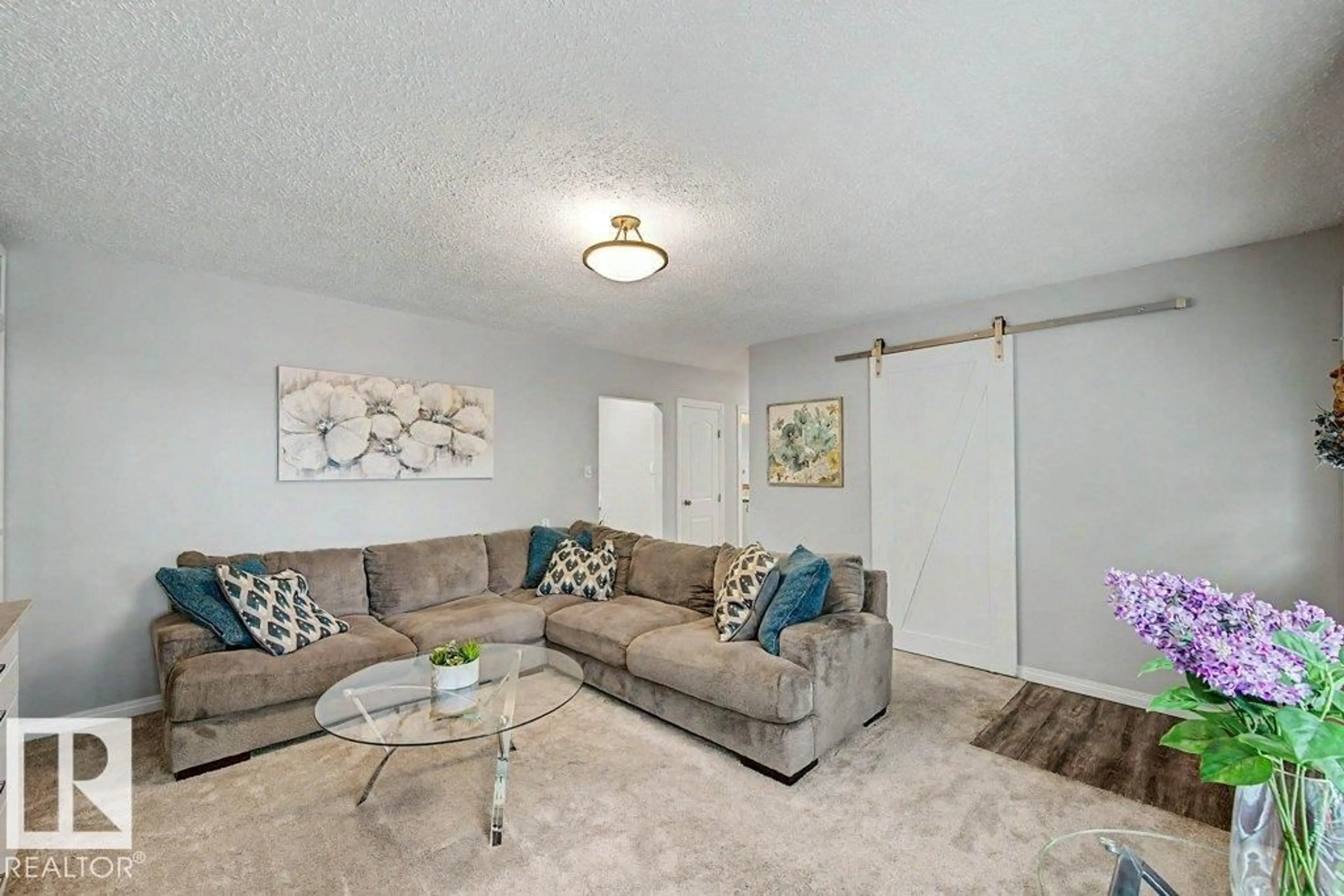 Living room with furniture, carpet floor for 12112 38 ST, Edmonton Alberta T5W2J1