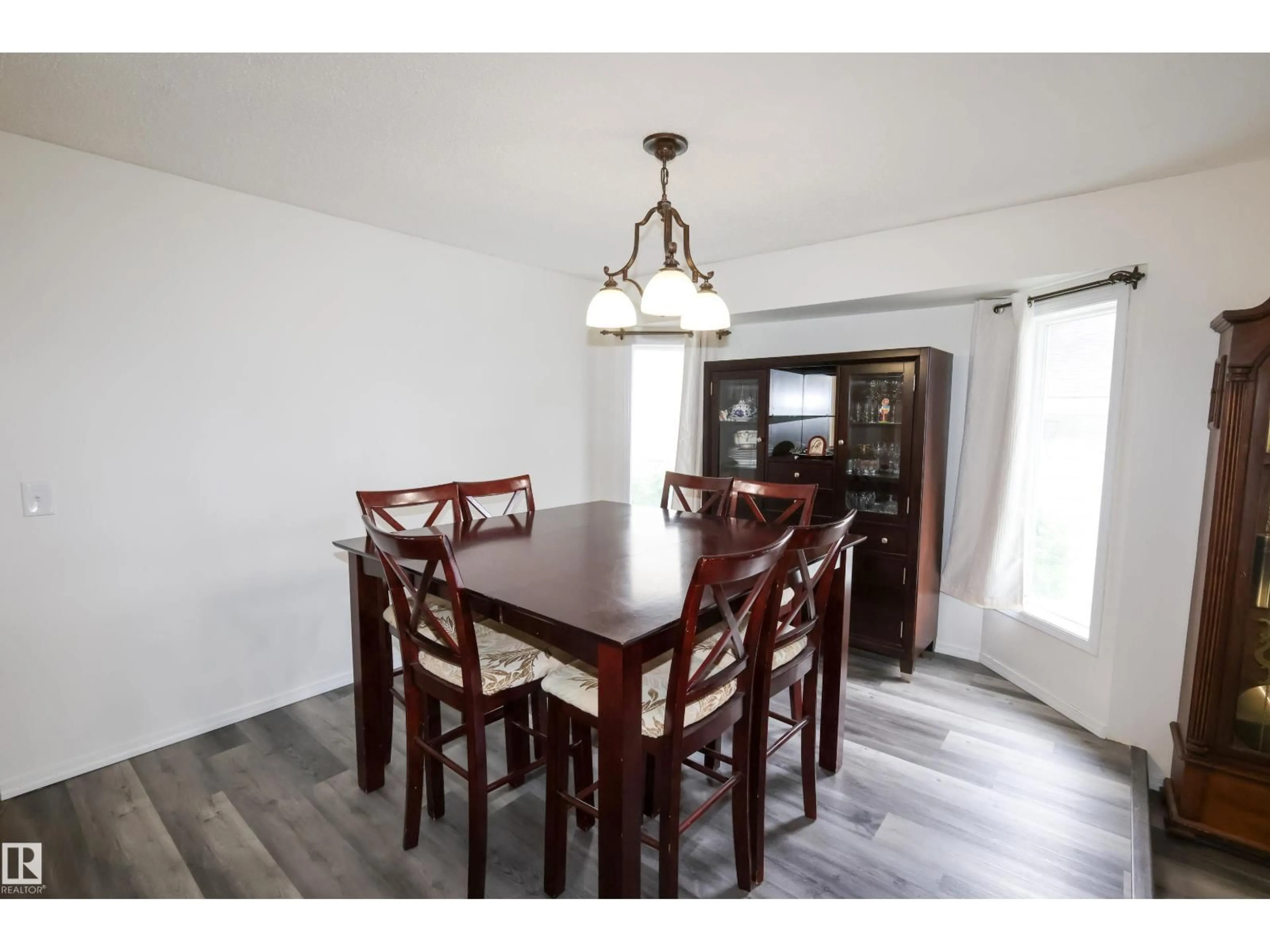 Dining room, wood/laminate floor for NW - 3467 39 ST, Edmonton Alberta T6L3Y9