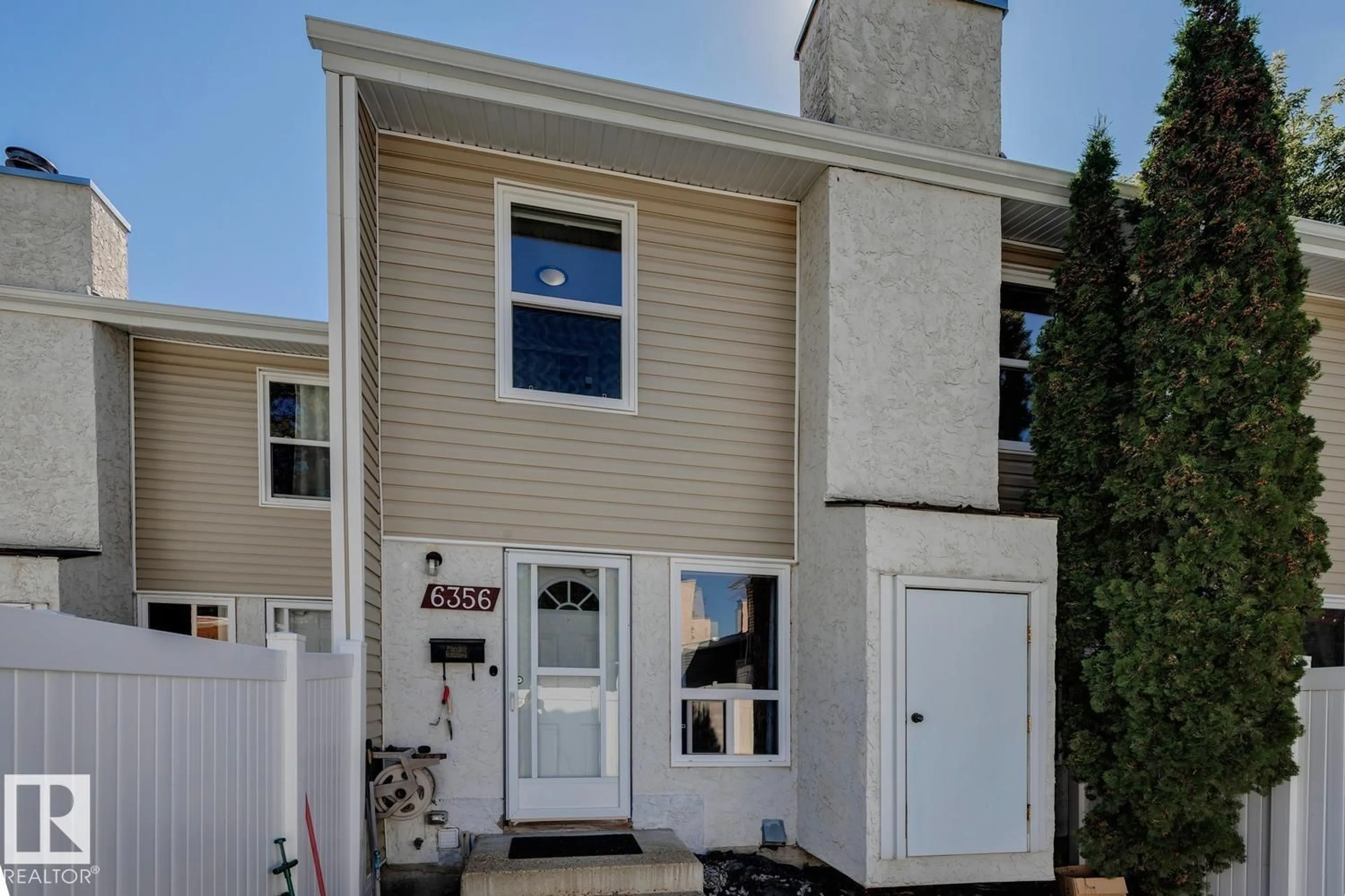 Home with vinyl exterior material, street for NW - 6356 184 ST, Edmonton Alberta T5T2N8