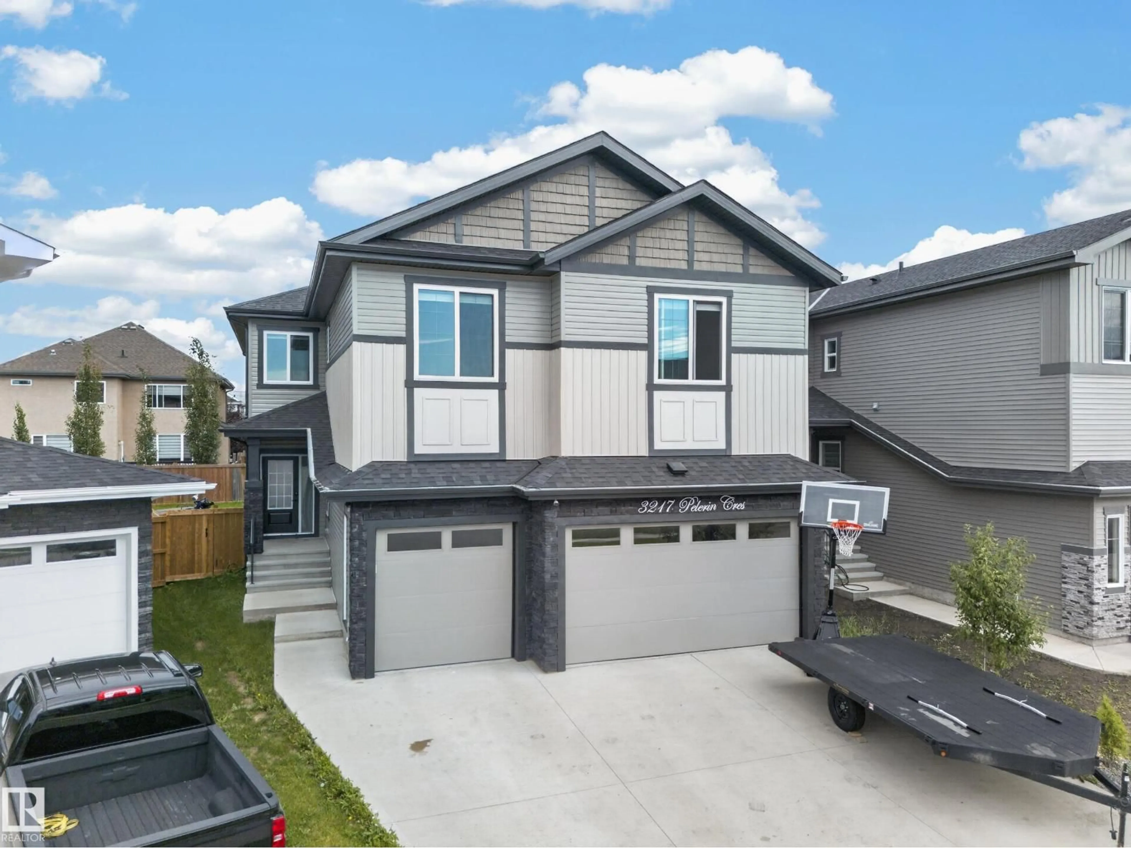 Home with vinyl exterior material, street for 3217 PELERIN CR, Beaumont Alberta T4X0E2