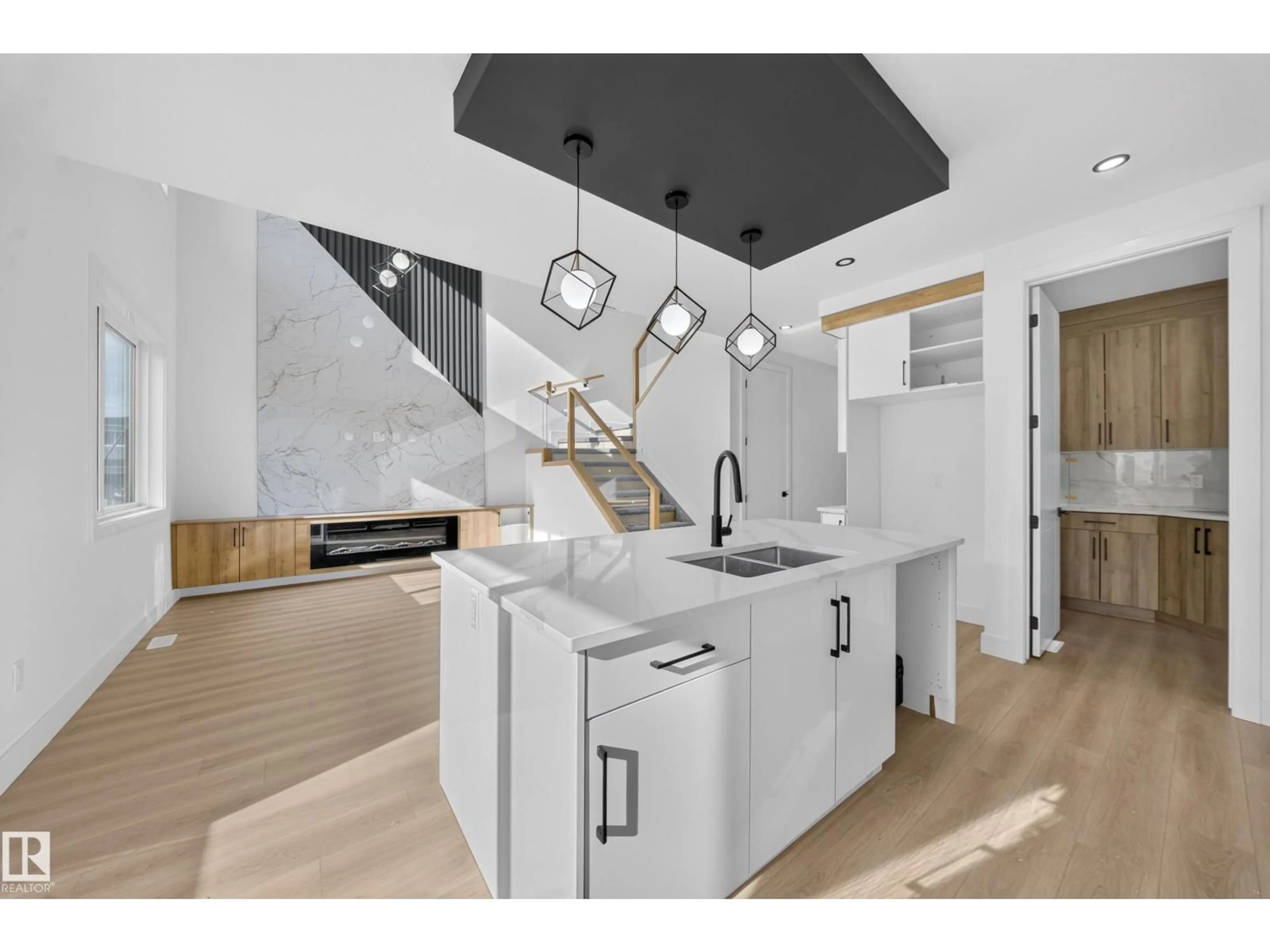 Open concept kitchen, unknown for 6706 176A AV, Edmonton Alberta T5Z0Y2