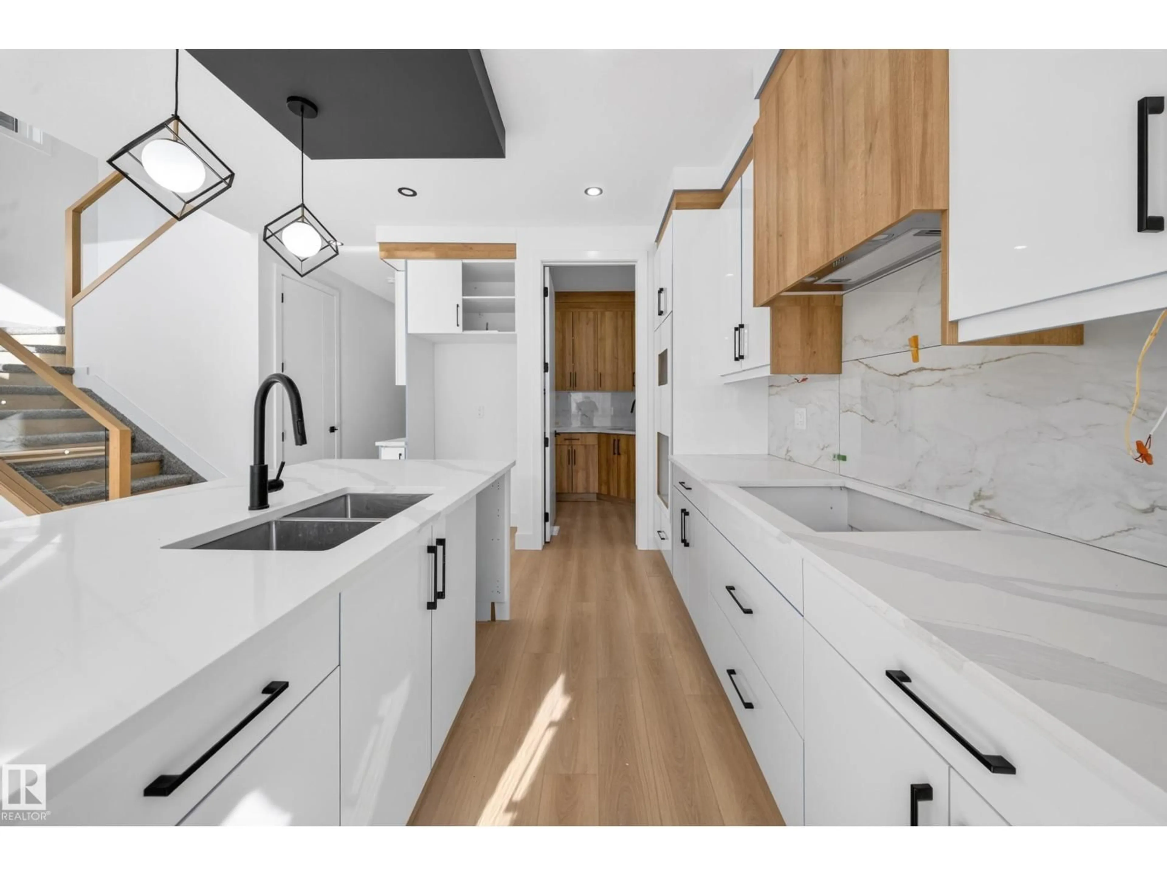 Open concept kitchen, unknown for 6706 176A AV, Edmonton Alberta T5Z0Y2