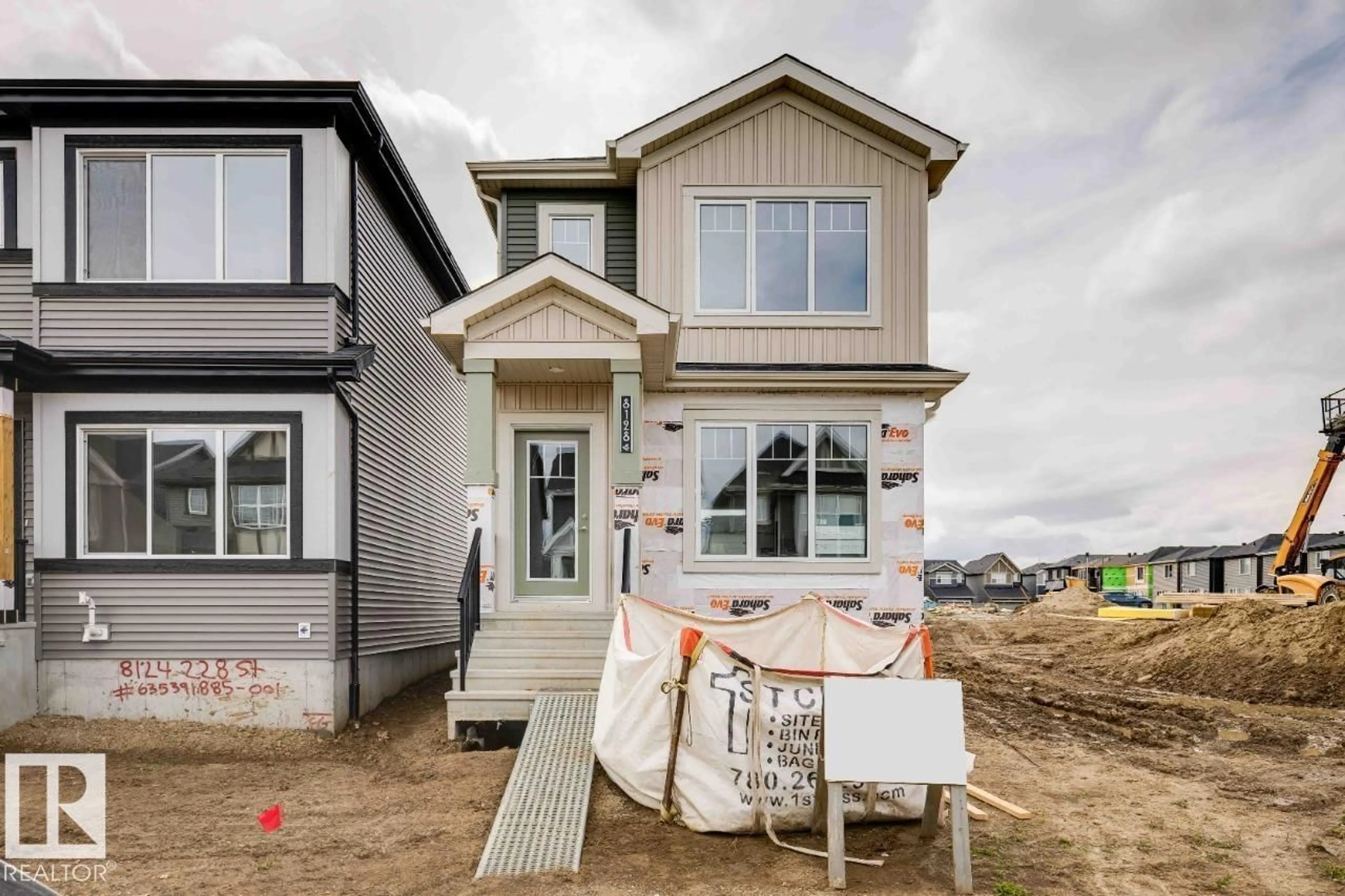 Home with vinyl exterior material, street for 8024 228 ST, Edmonton Alberta T5T5X7