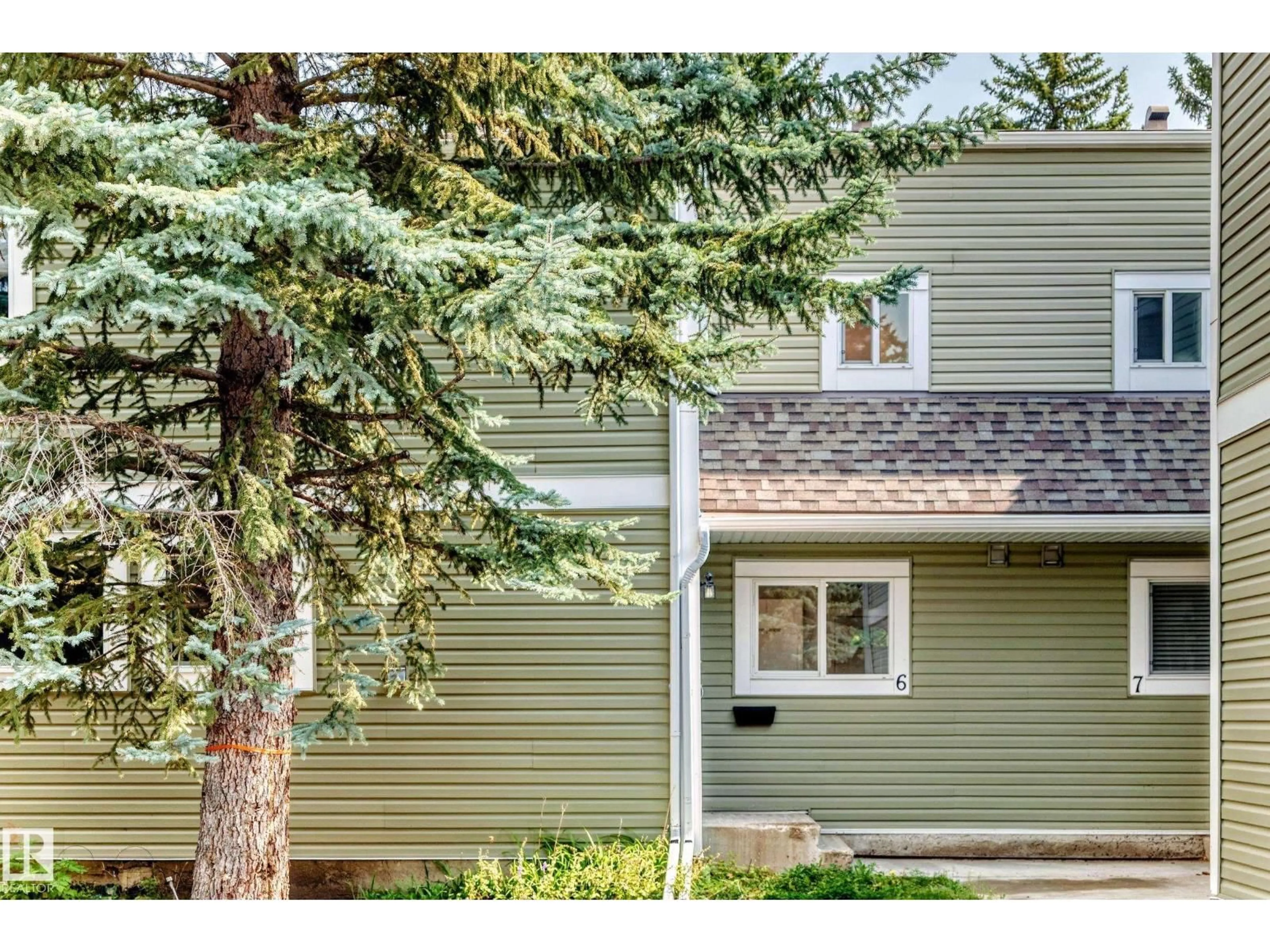 Home with vinyl exterior material, street for #6 - 1820 56 ST, Edmonton Alberta T6L5L4