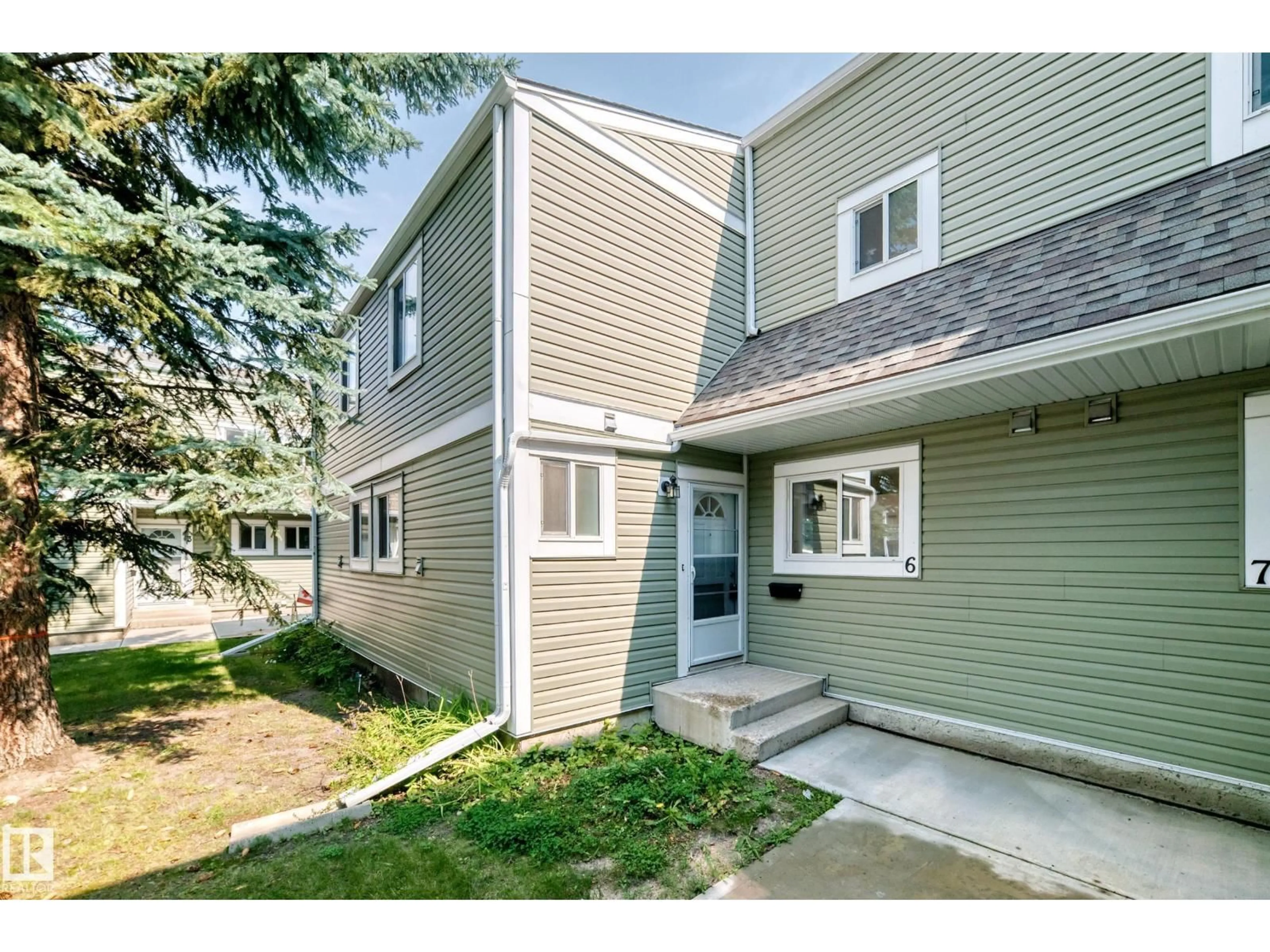 Home with vinyl exterior material, street for #6 - 1820 56 ST, Edmonton Alberta T6L5L4