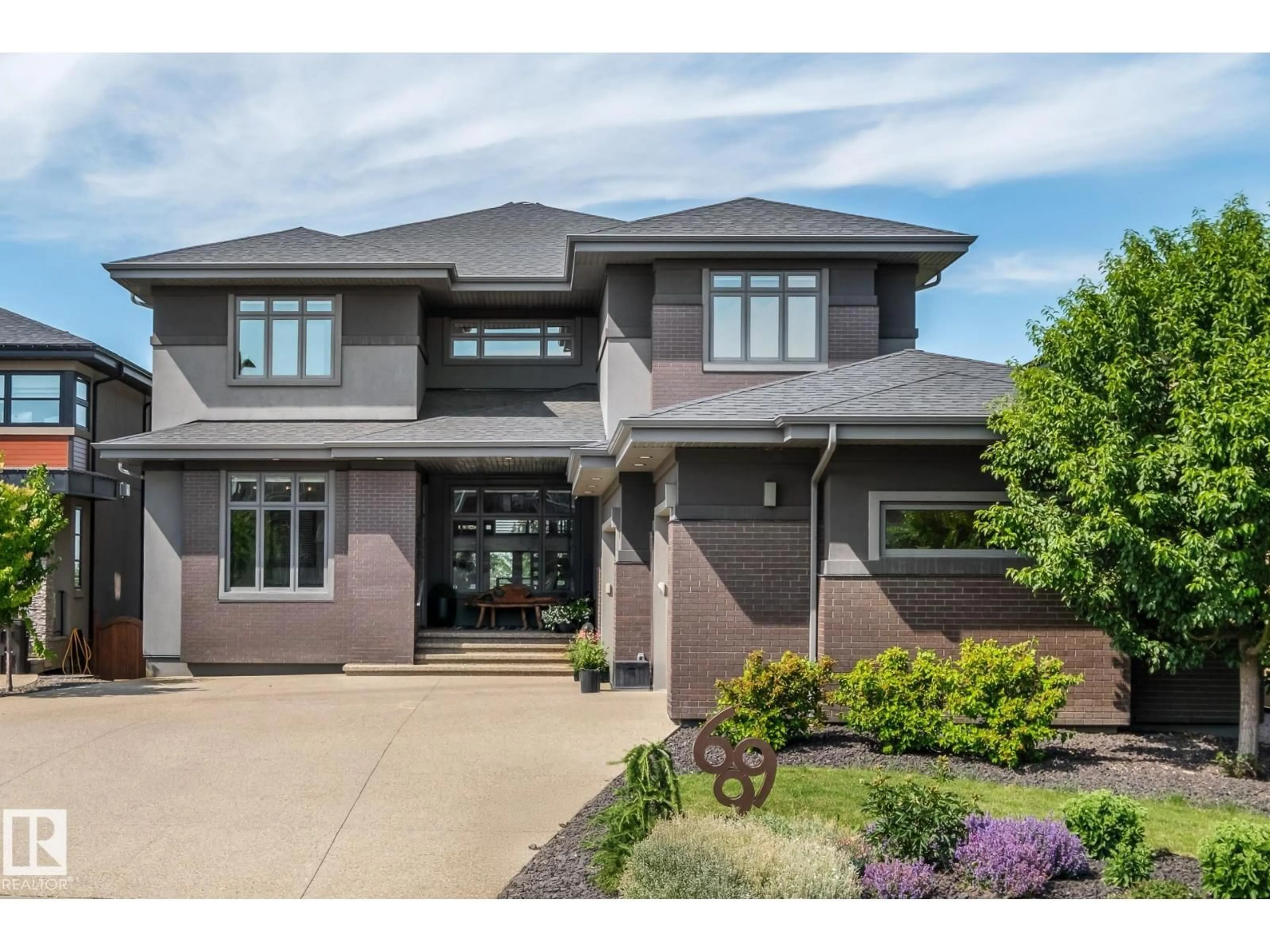 Home with brick exterior material, street for 699 HOWATT DR, Edmonton Alberta T6W3K3