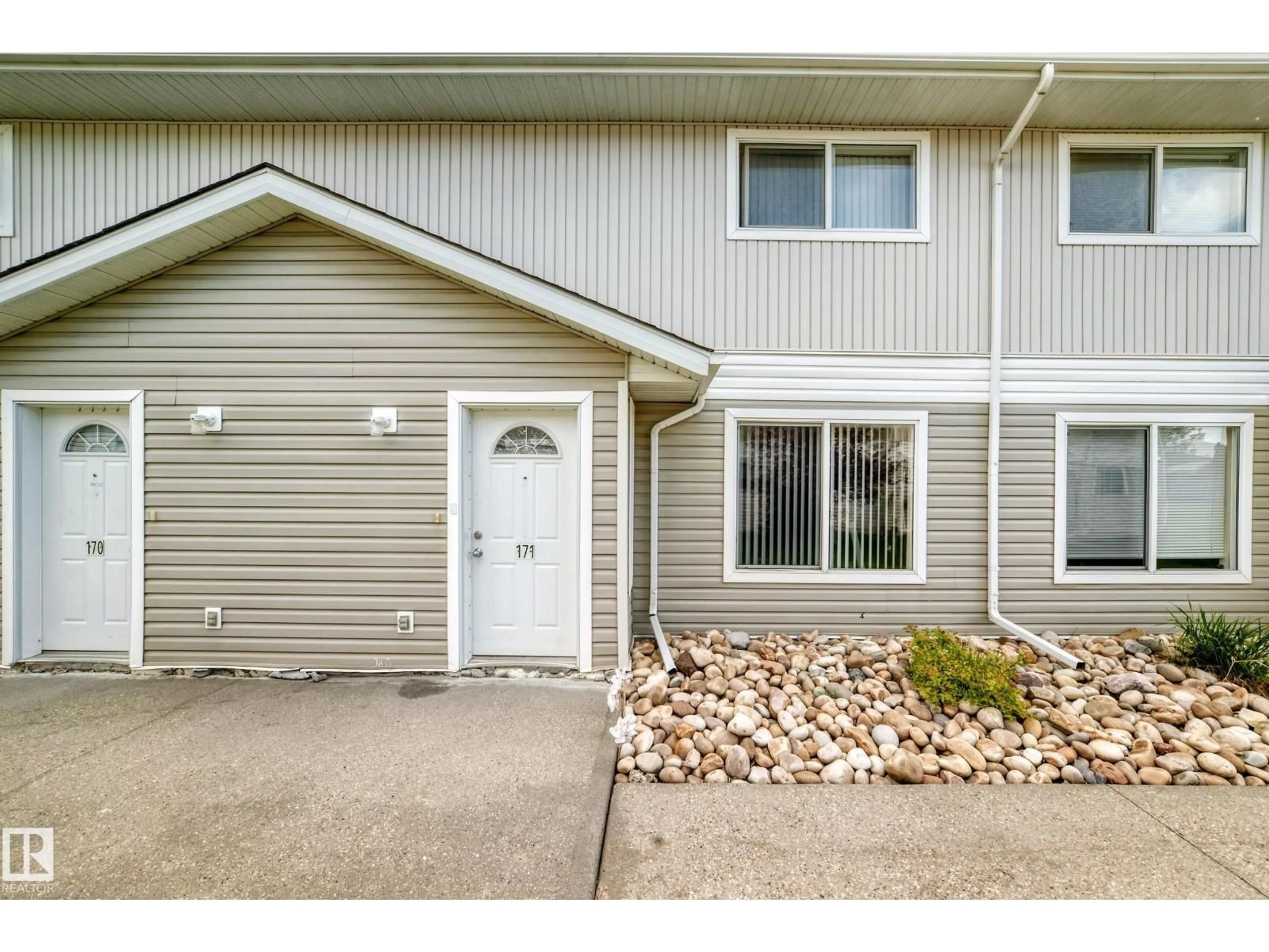 Home with vinyl exterior material, street for 180 - 171 BRIDGEPORT BV, Leduc Alberta T9E8S1