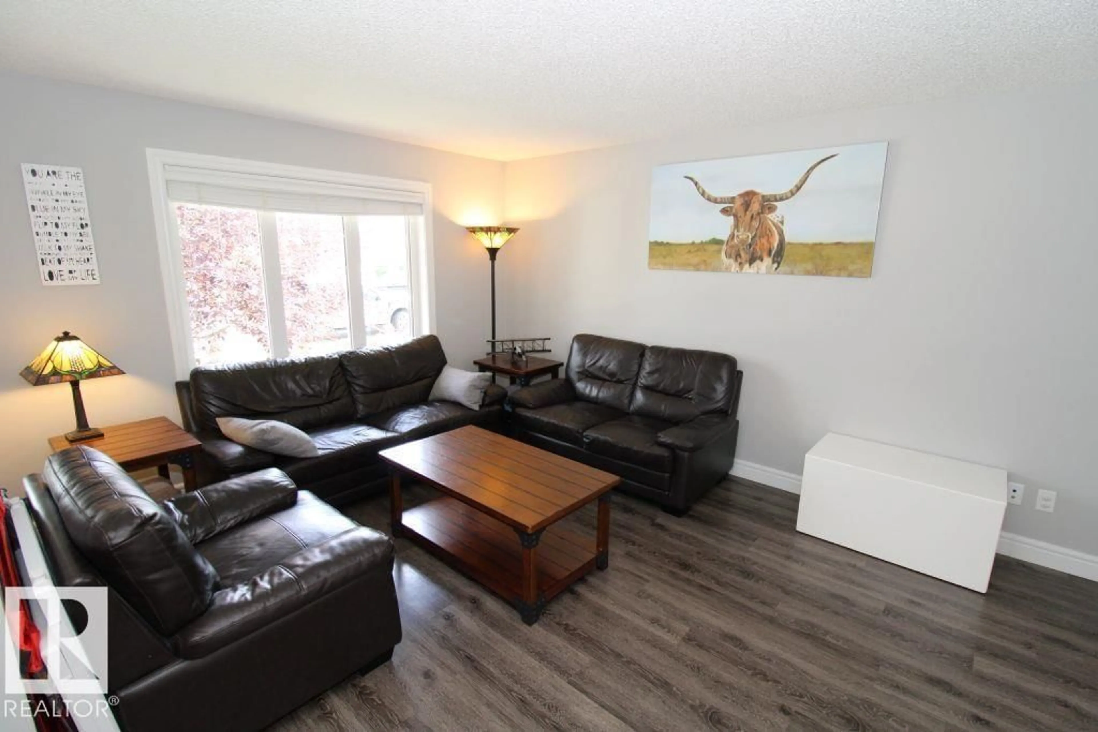 Living room with furniture, wood/laminate floor for 31 HARVEST RIDGE DR, Spruce Grove Alberta T7S0S1