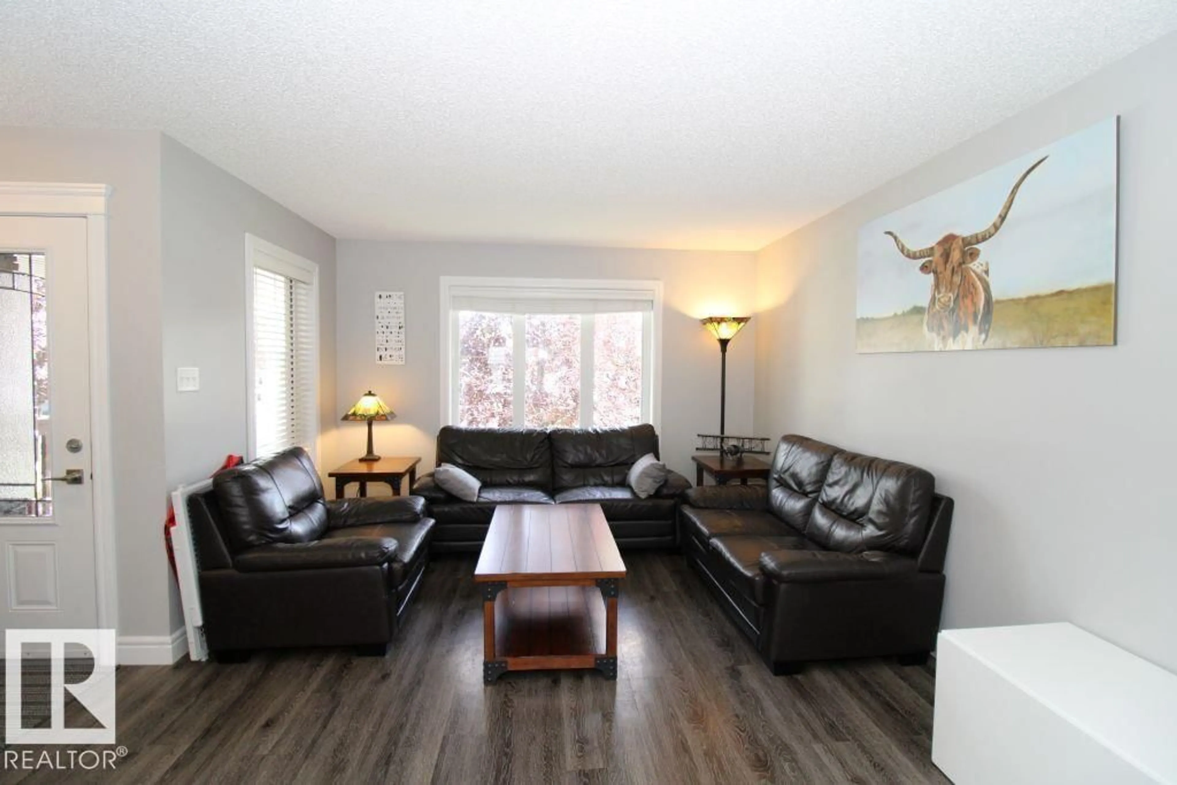 Living room with furniture, wood/laminate floor for 31 HARVEST RIDGE DR, Spruce Grove Alberta T7S0S1