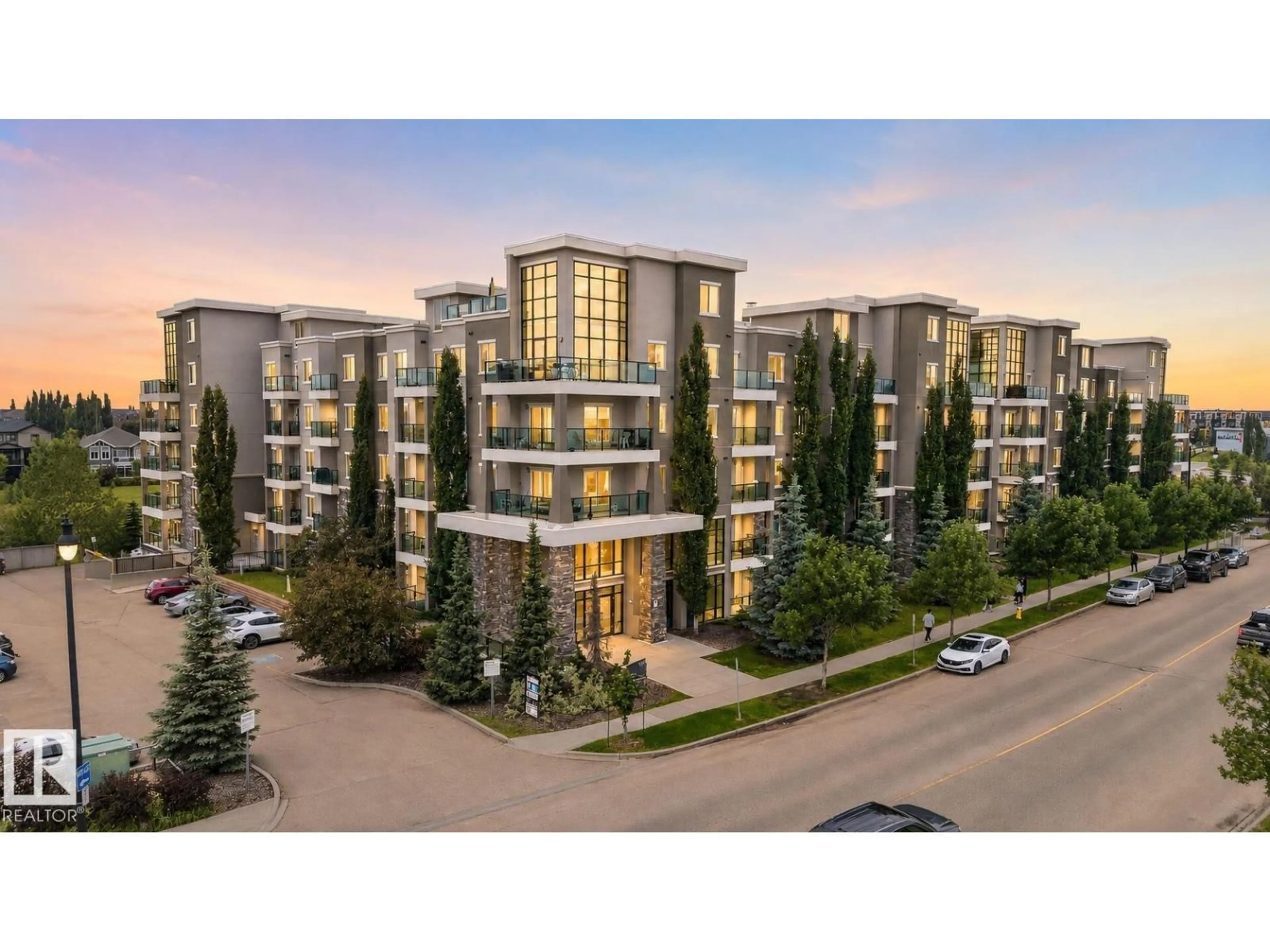 A pic from outside/outdoor area/front of a property/back of a property/a pic from drone, unknown for #306 - 1238 WINDERMERE WY, Edmonton Alberta T6W2J3