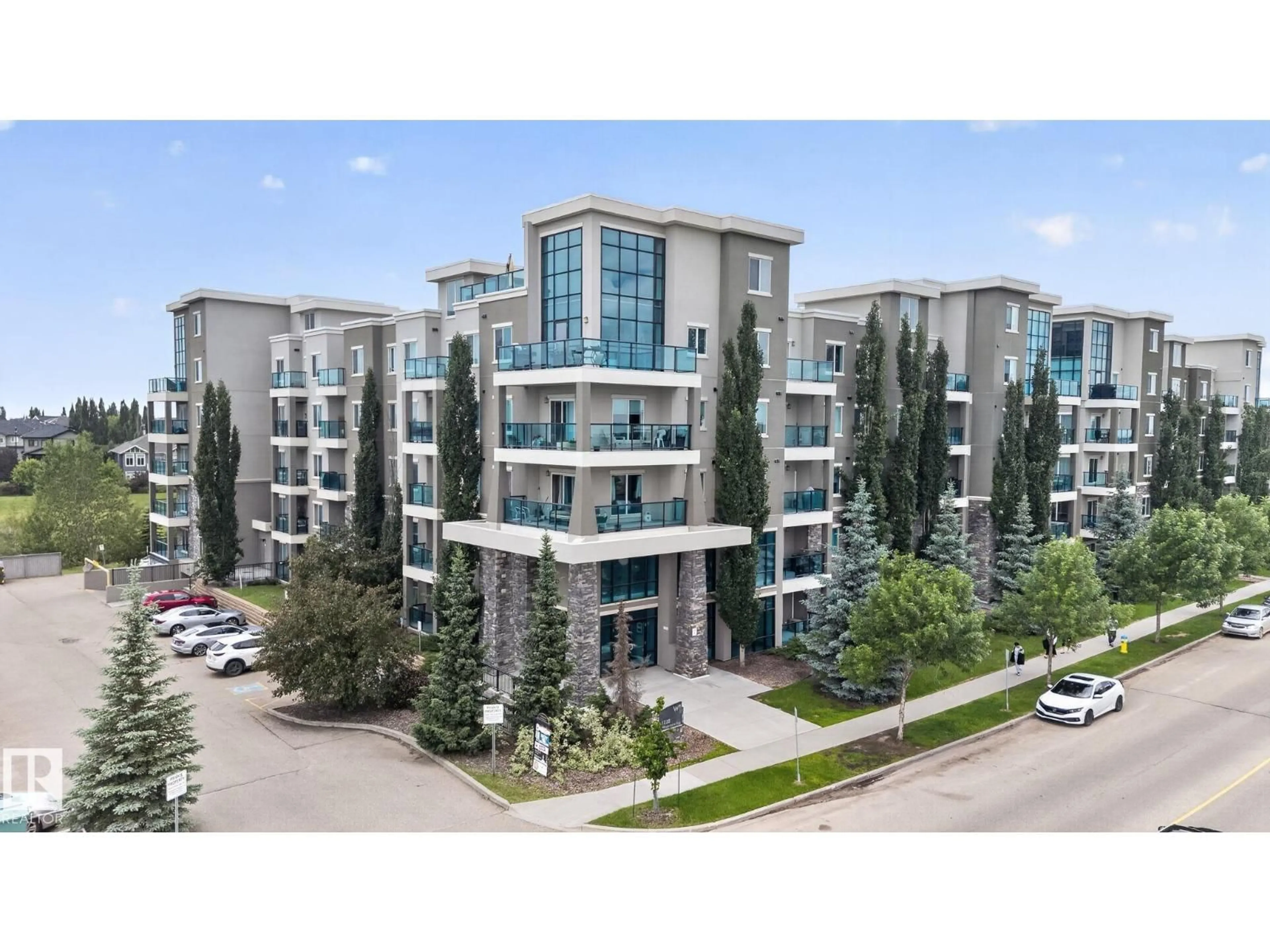 A pic from outside/outdoor area/front of a property/back of a property/a pic from drone, building for #306 - 1238 WINDERMERE WY, Edmonton Alberta T6W2J3