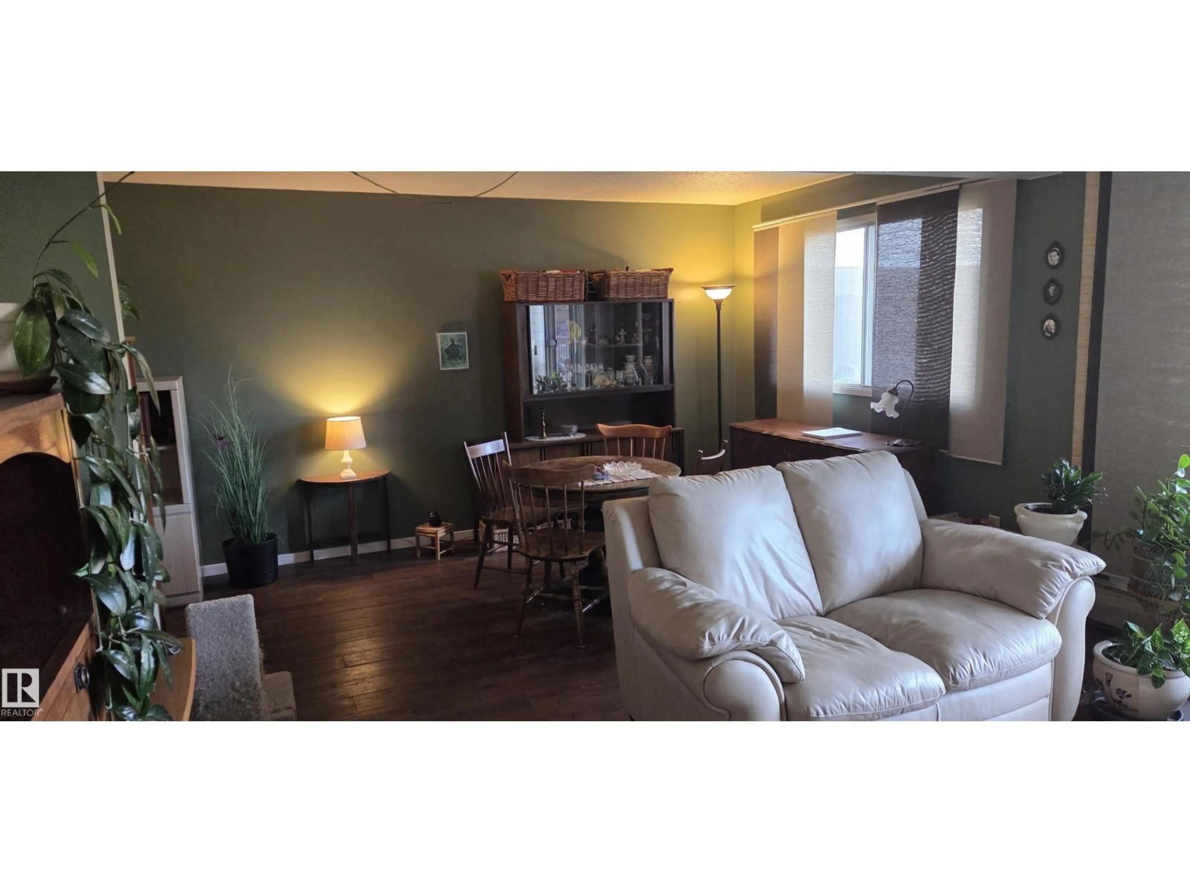 Living room with furniture, wood/laminate floor for #215 - 4404 122 ST, Edmonton Alberta T6J4A9