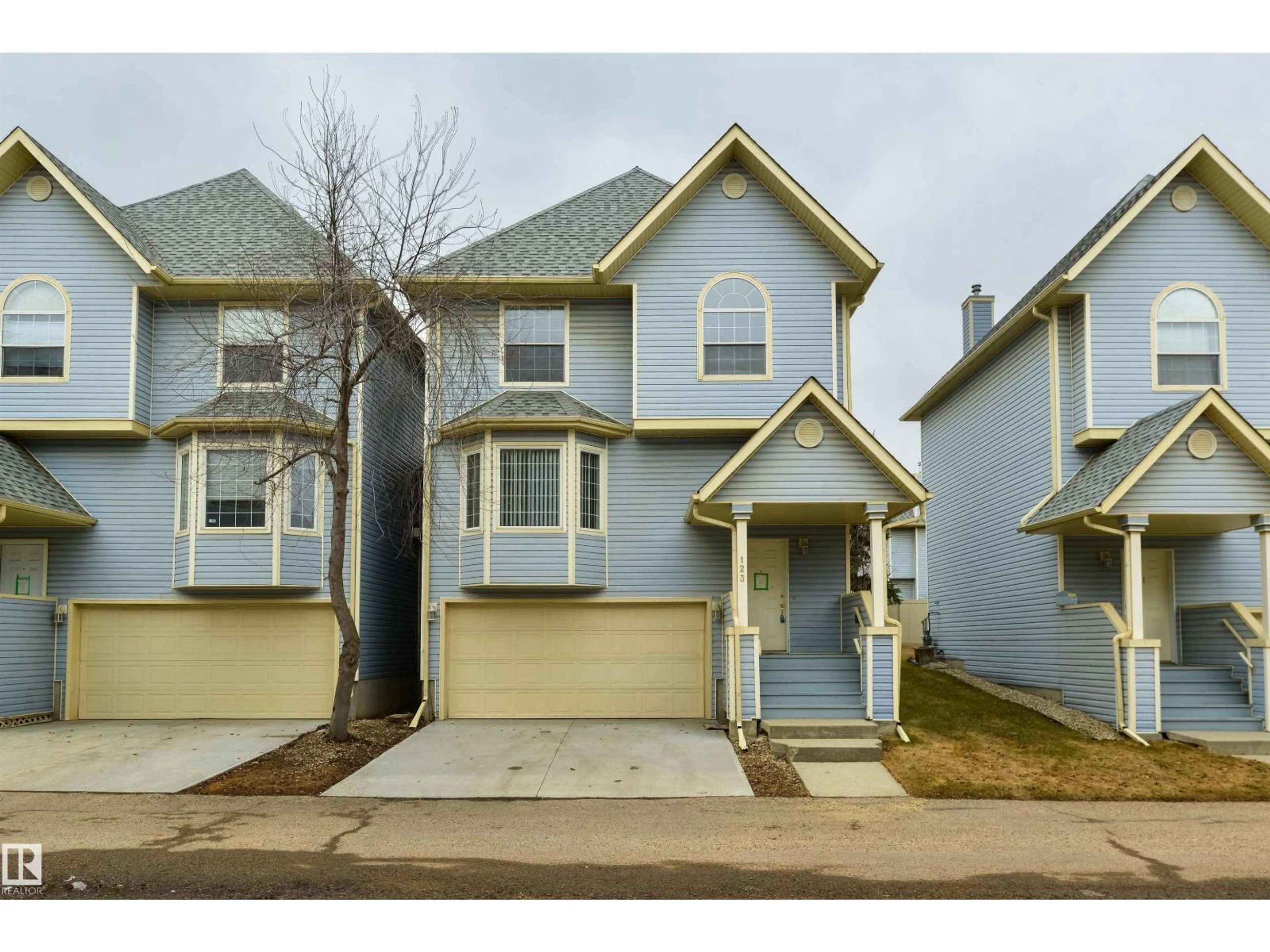 Home with vinyl exterior material, street for #123 - 1670 JAMHA RD, Edmonton Alberta T6L7B3