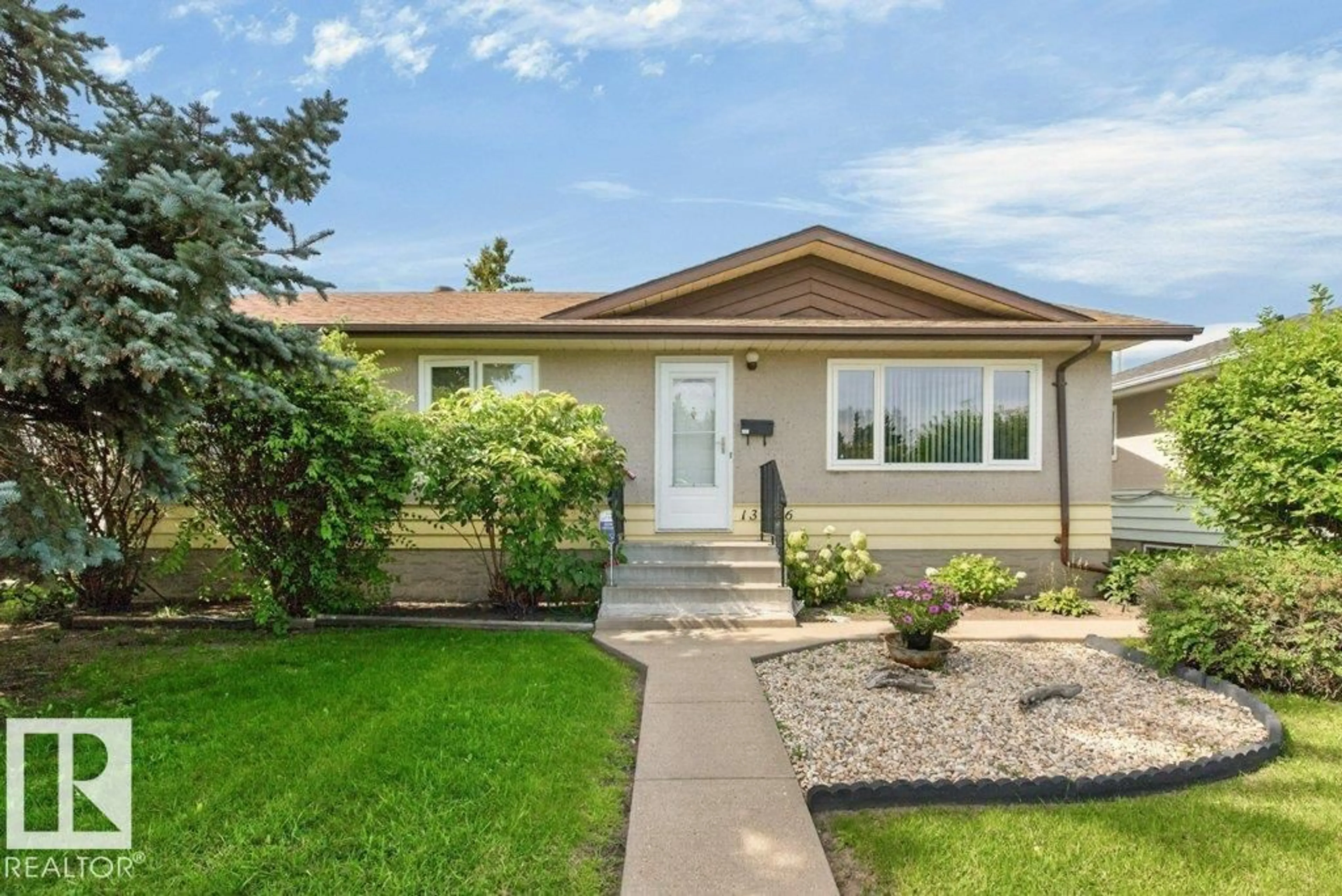 Home with vinyl exterior material, street for 13526 91 ST, Edmonton Alberta T5E3R1