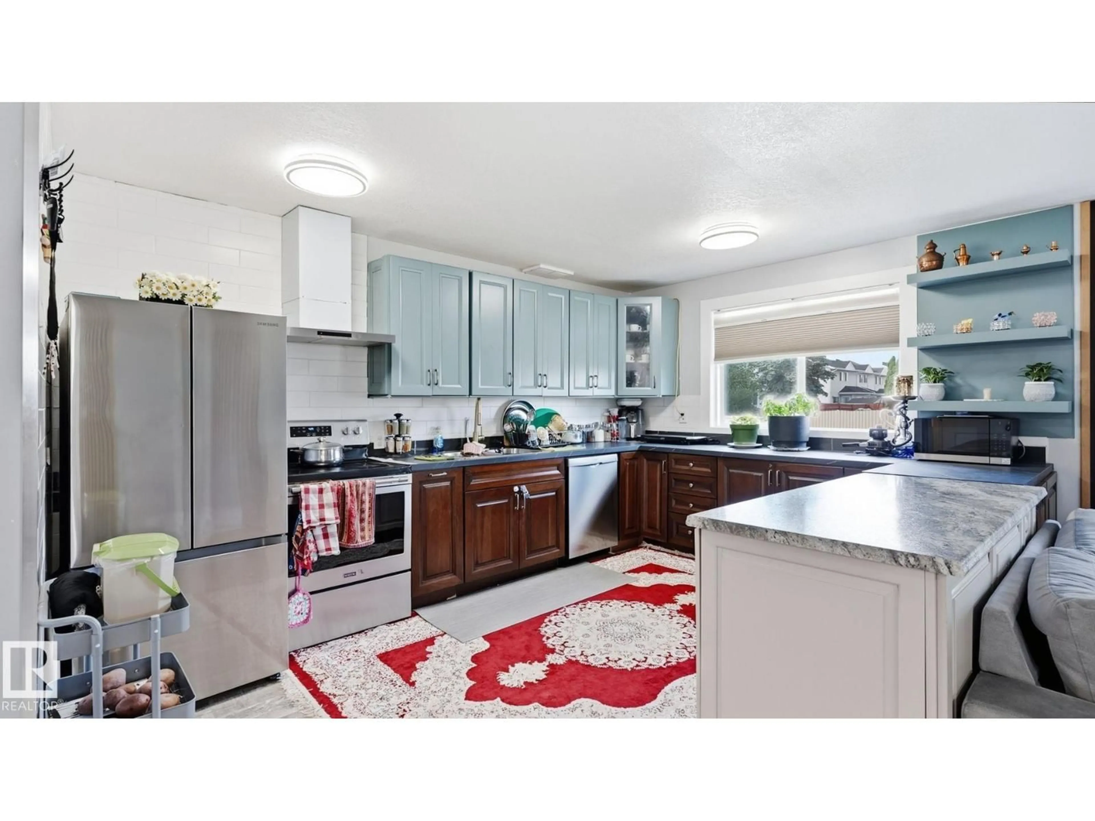 Open concept kitchen, ceramic/tile floor for 493 KIRKNESS RD, Edmonton Alberta T5Y2J1