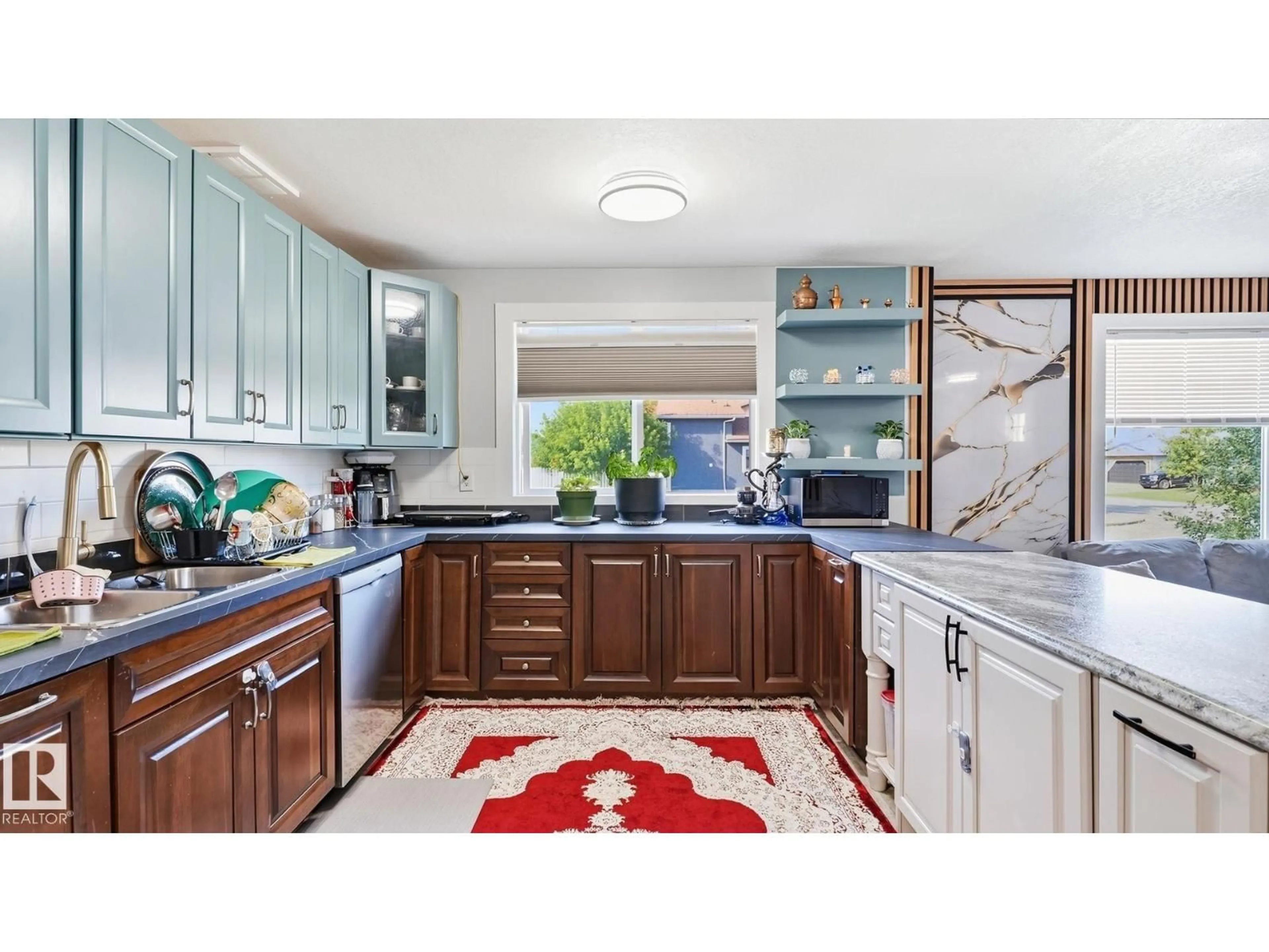 Open concept kitchen, ceramic/tile floor for 493 KIRKNESS RD, Edmonton Alberta T5Y2J1