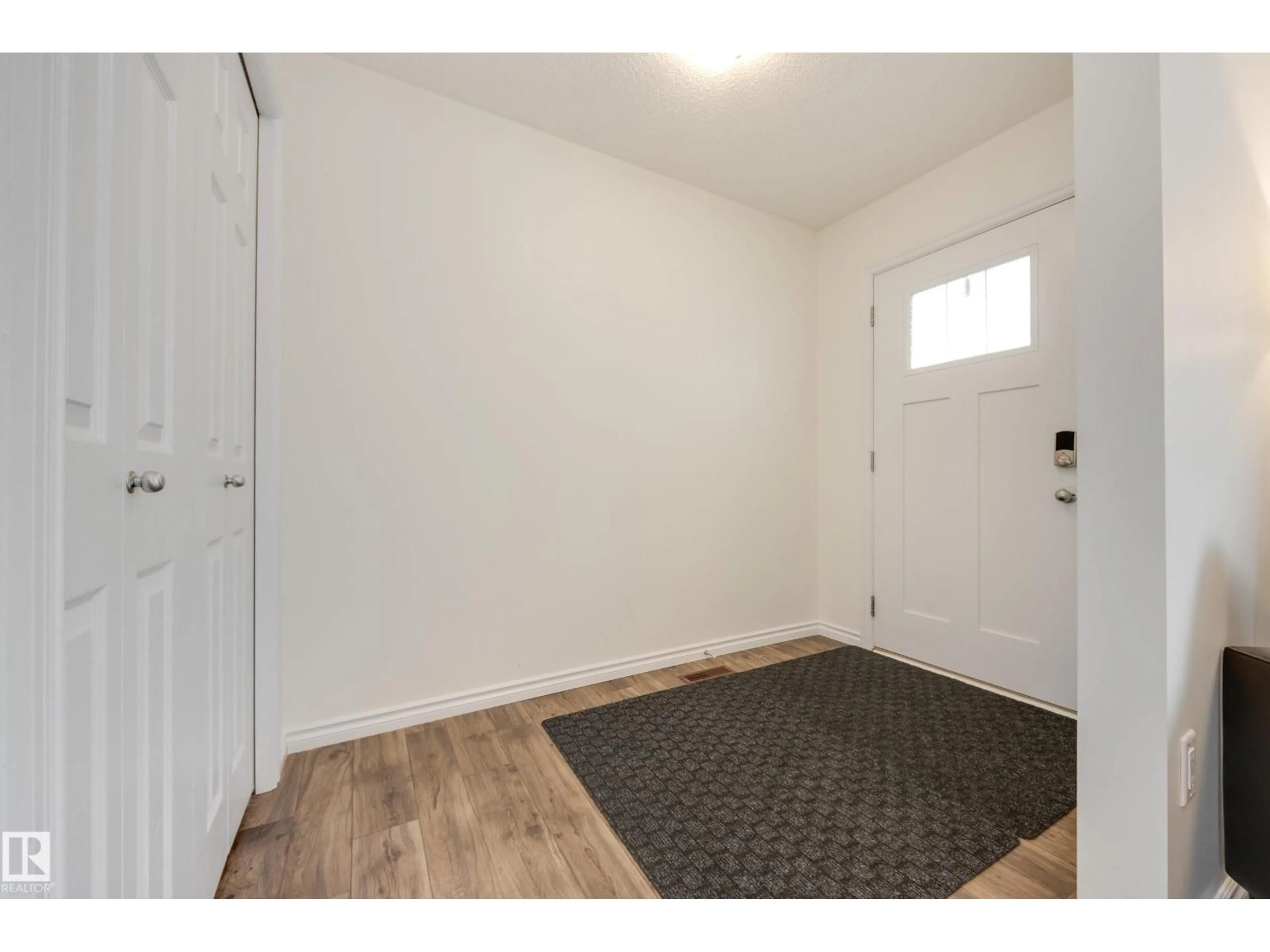 Indoor entryway for 22123 88 AV, Edmonton Alberta T5T7H3