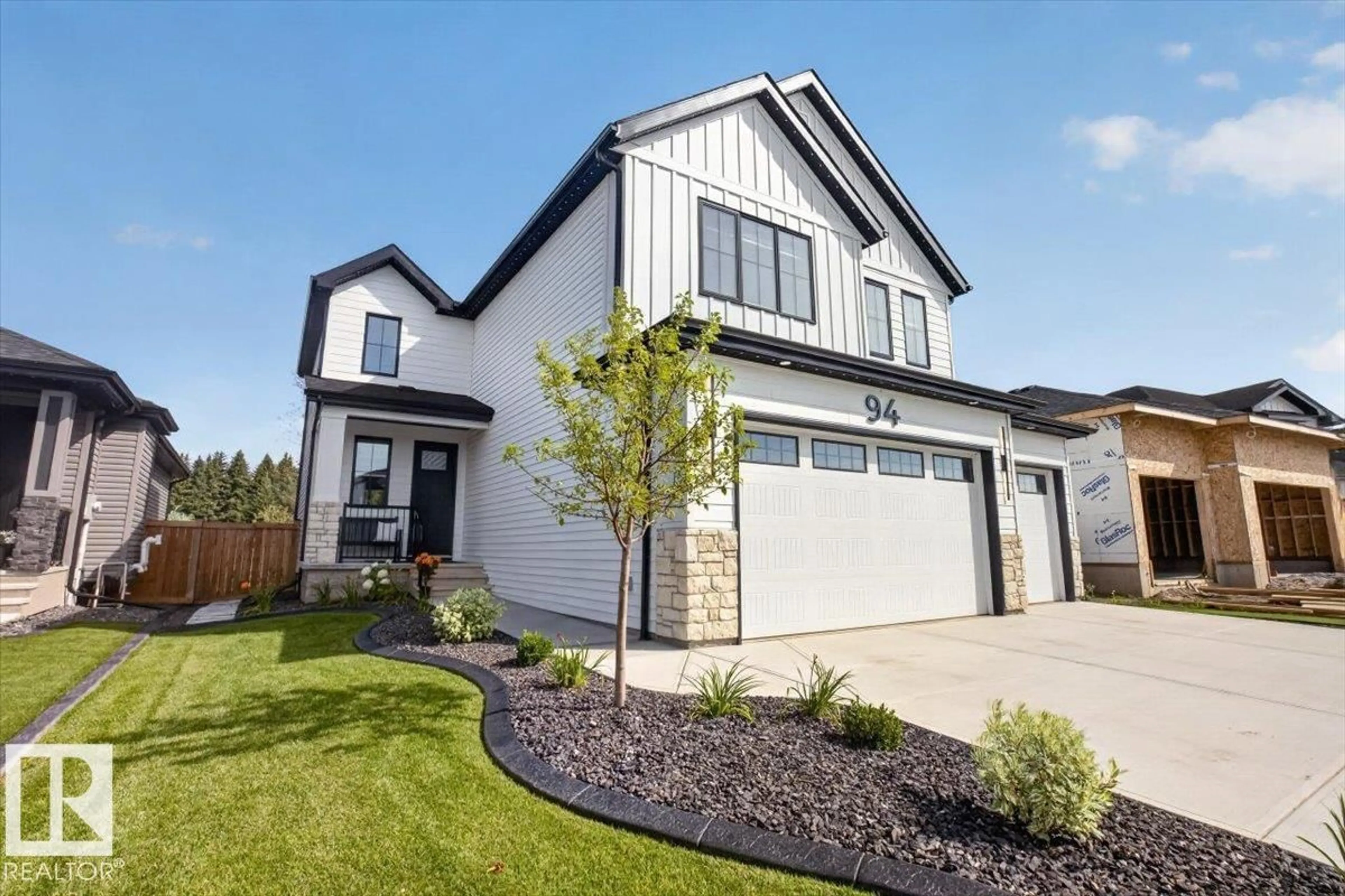 Home with vinyl exterior material, street for 94 HARVEST CR, Ardrossan Alberta T8E0A8