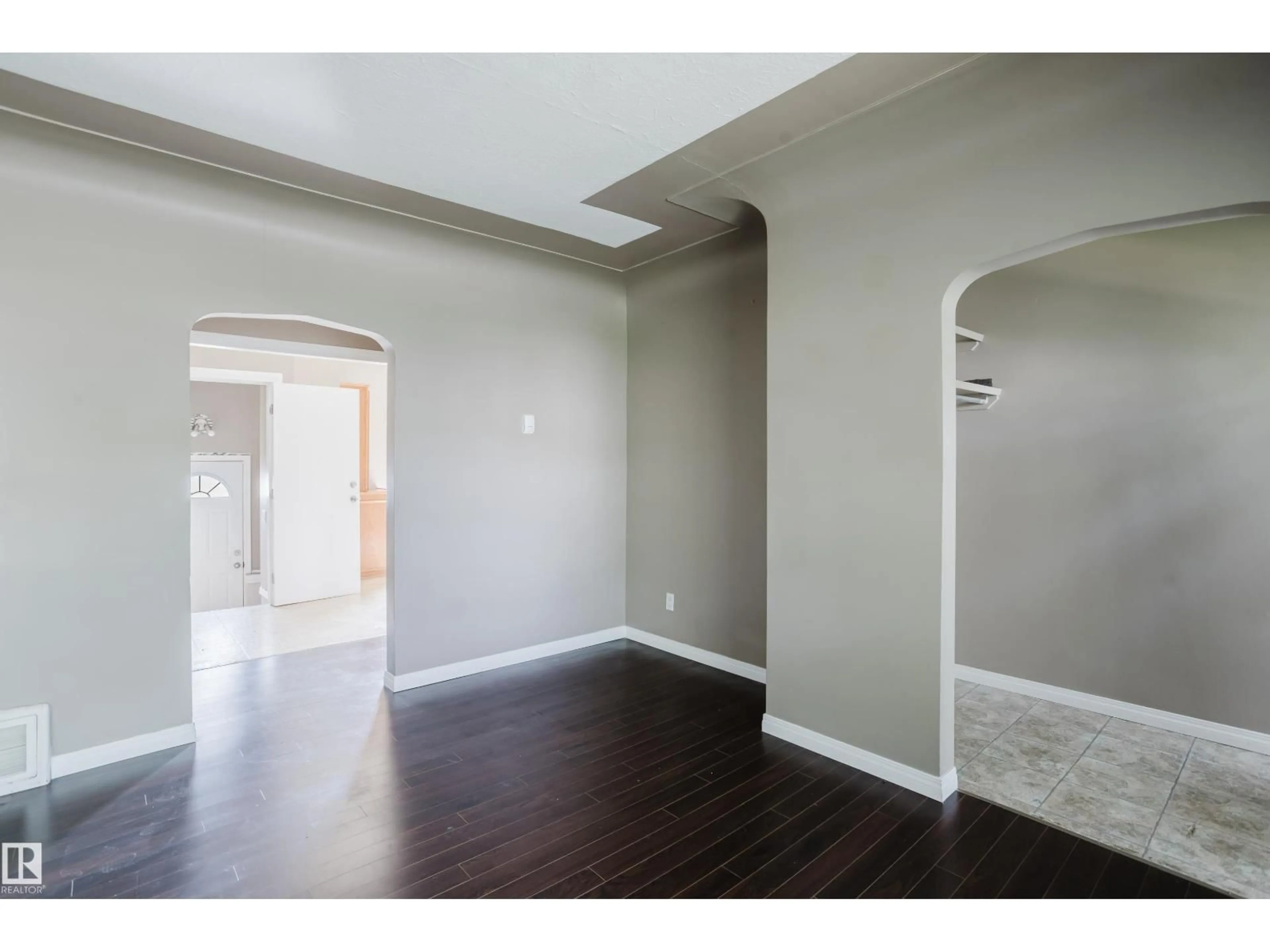 Indoor entryway for 12811 117 AV, Edmonton Alberta T5M3H2