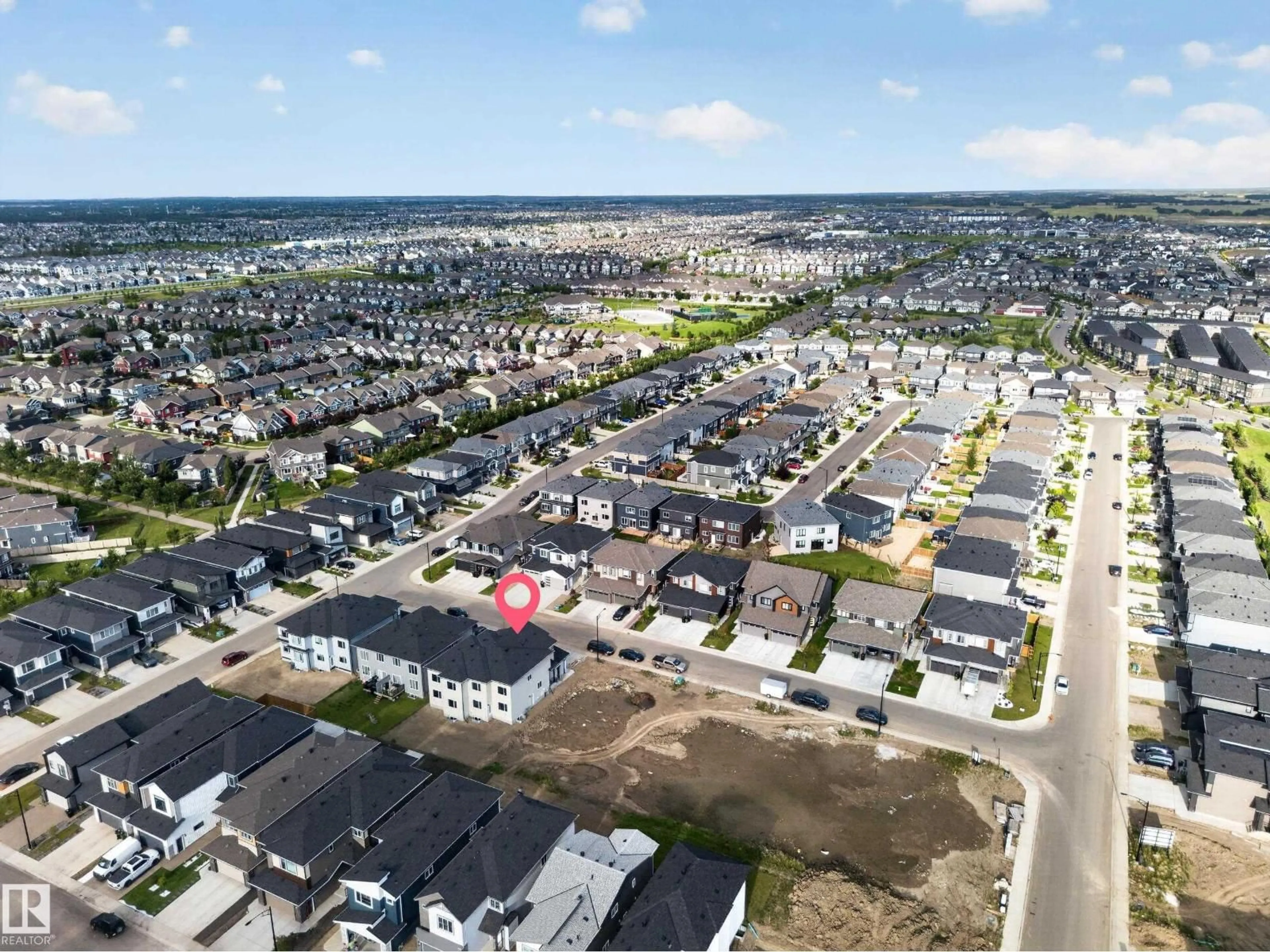 A pic from outside/outdoor area/front of a property/back of a property/a pic from drone, street for SW - 8512 MAYDAY RU, Edmonton Alberta T6X3E6