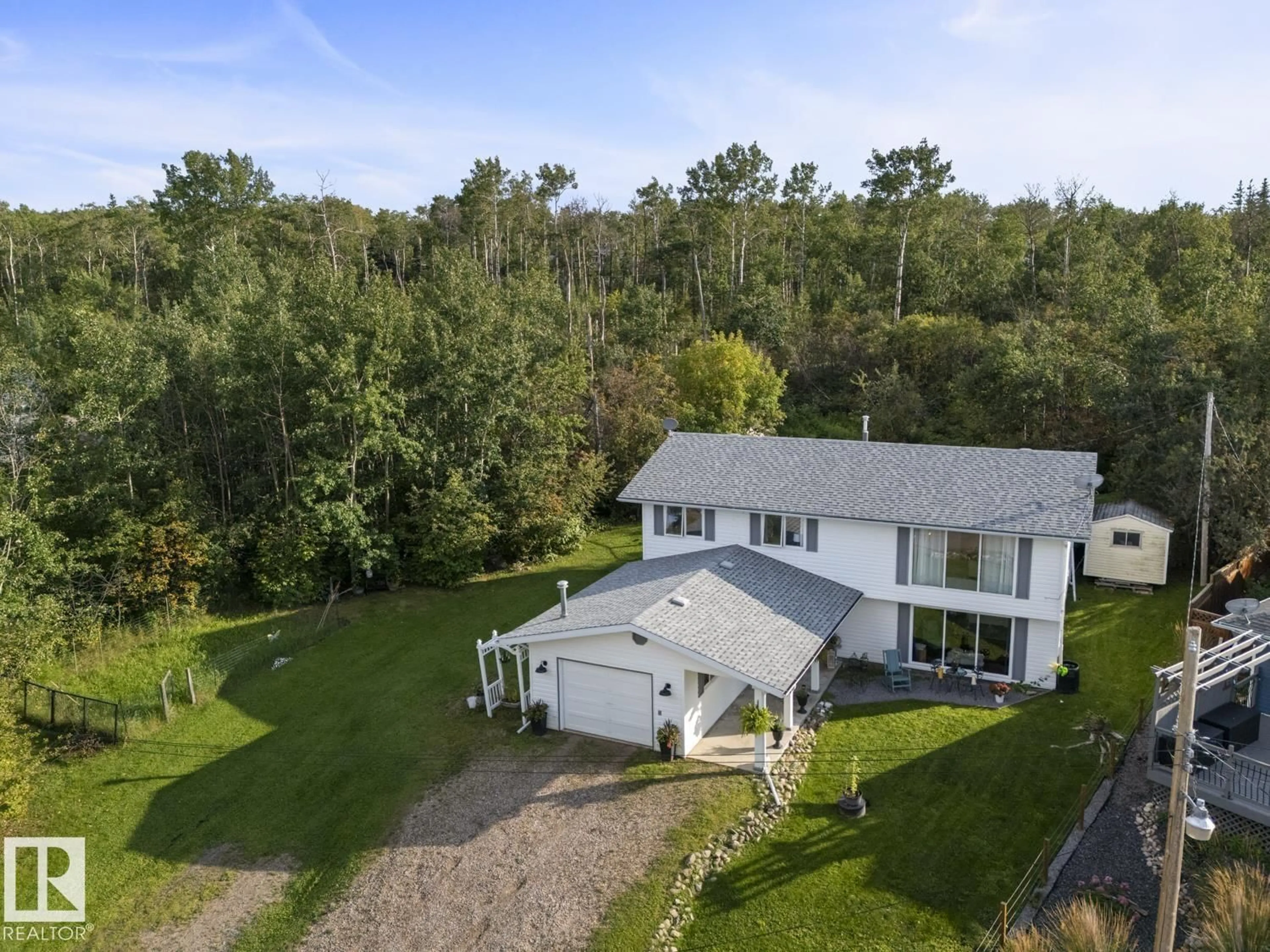 A pic from outside/outdoor area/front of a property/back of a property/a pic from drone, water/lake/river/ocean view for 315 PERCH CL, Rural Bonnyville M.D. Alberta T9N2J6